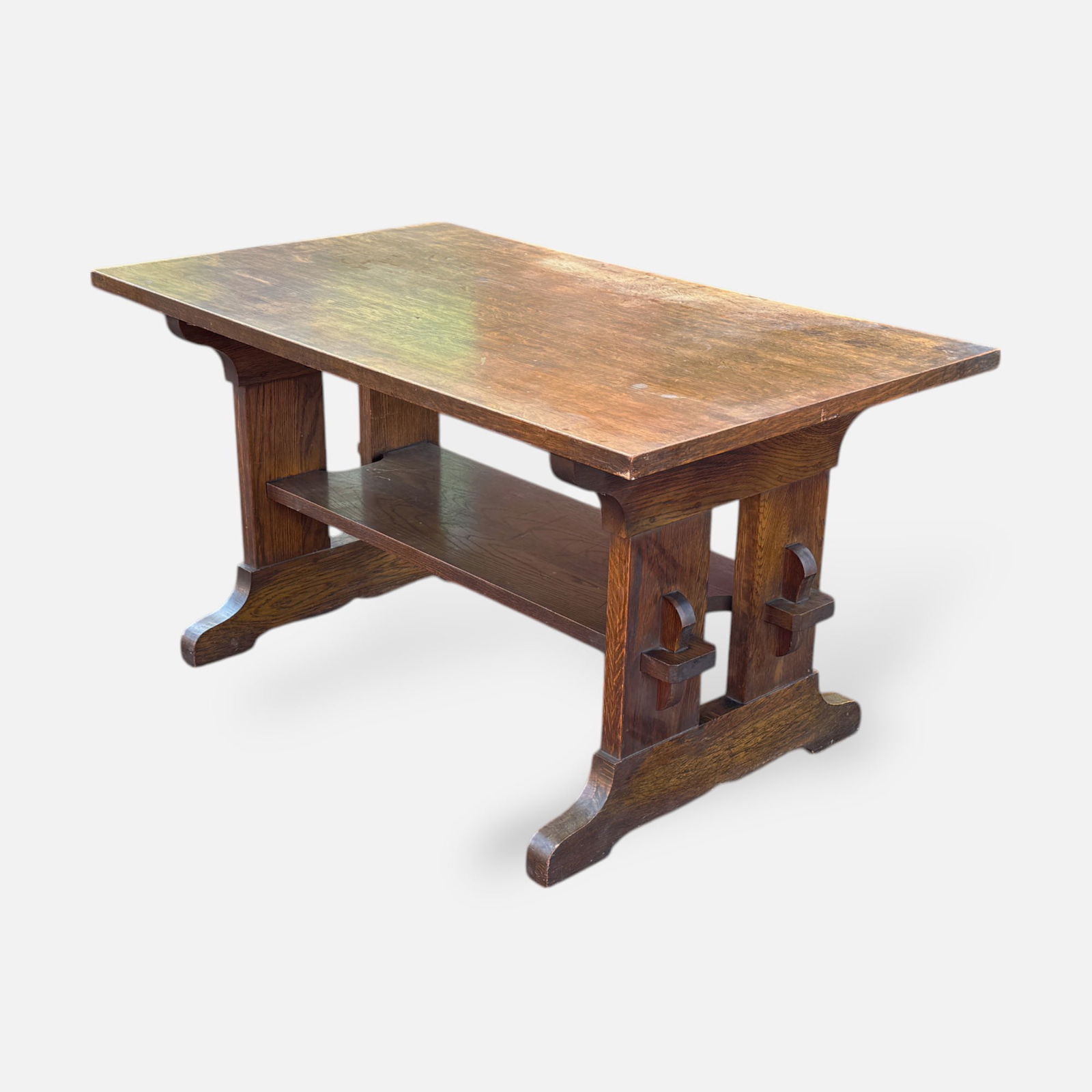 L. & J.G. Stickley Arts & Crafts Mission Oak Trestle Table: Ca. first quarter 20thC. Good age-appropriate condition. Top appears to have been cleaned, otherwise, appears to retain original finish. Has a partial paper label to the underside of table top. WIth n