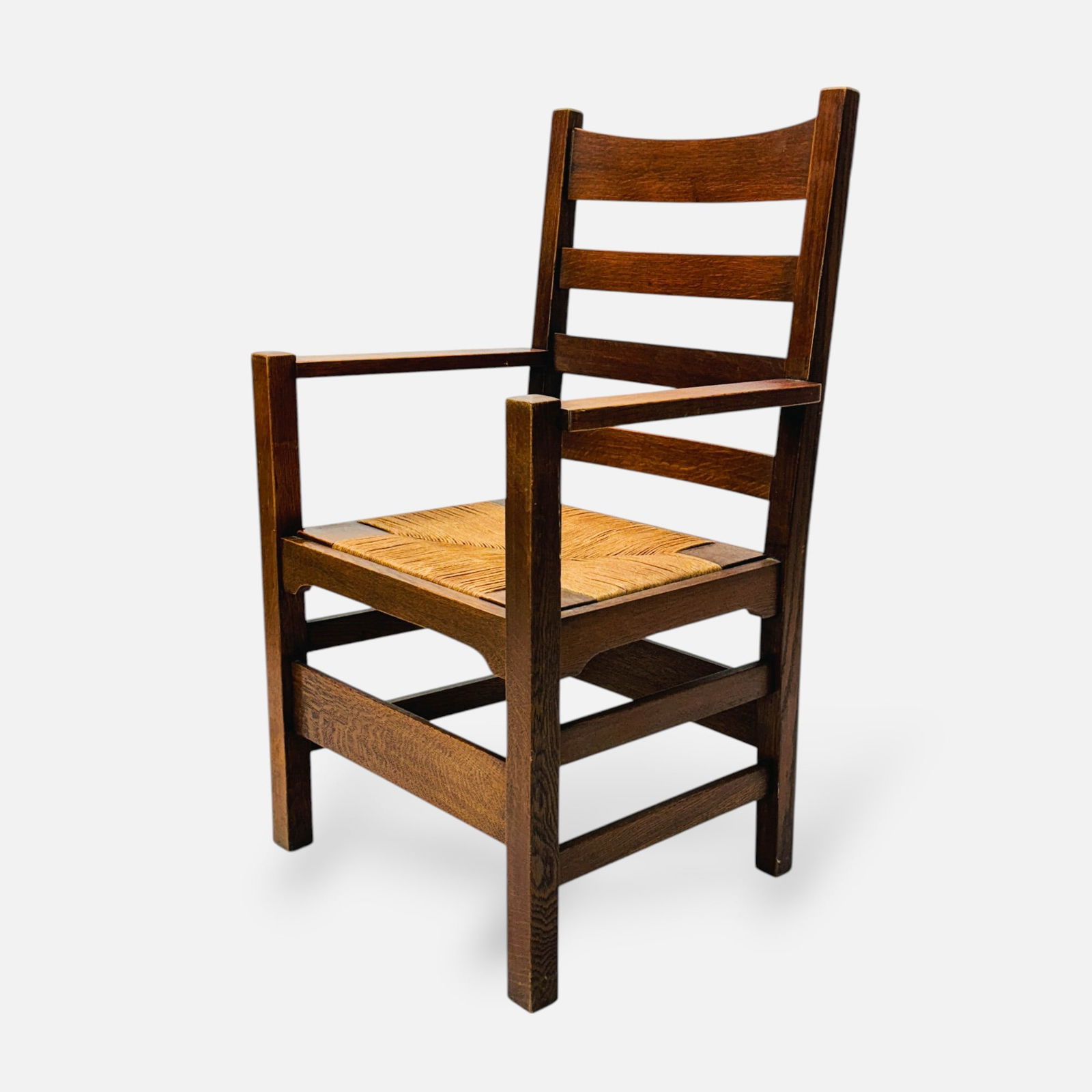 Early Gustav Stickley Arts & Crafts Mission Oak Armchair: Very good condition, with minor age-appropriate surface wear. Approx. seat height 18". Marked with early red Stickley mark.