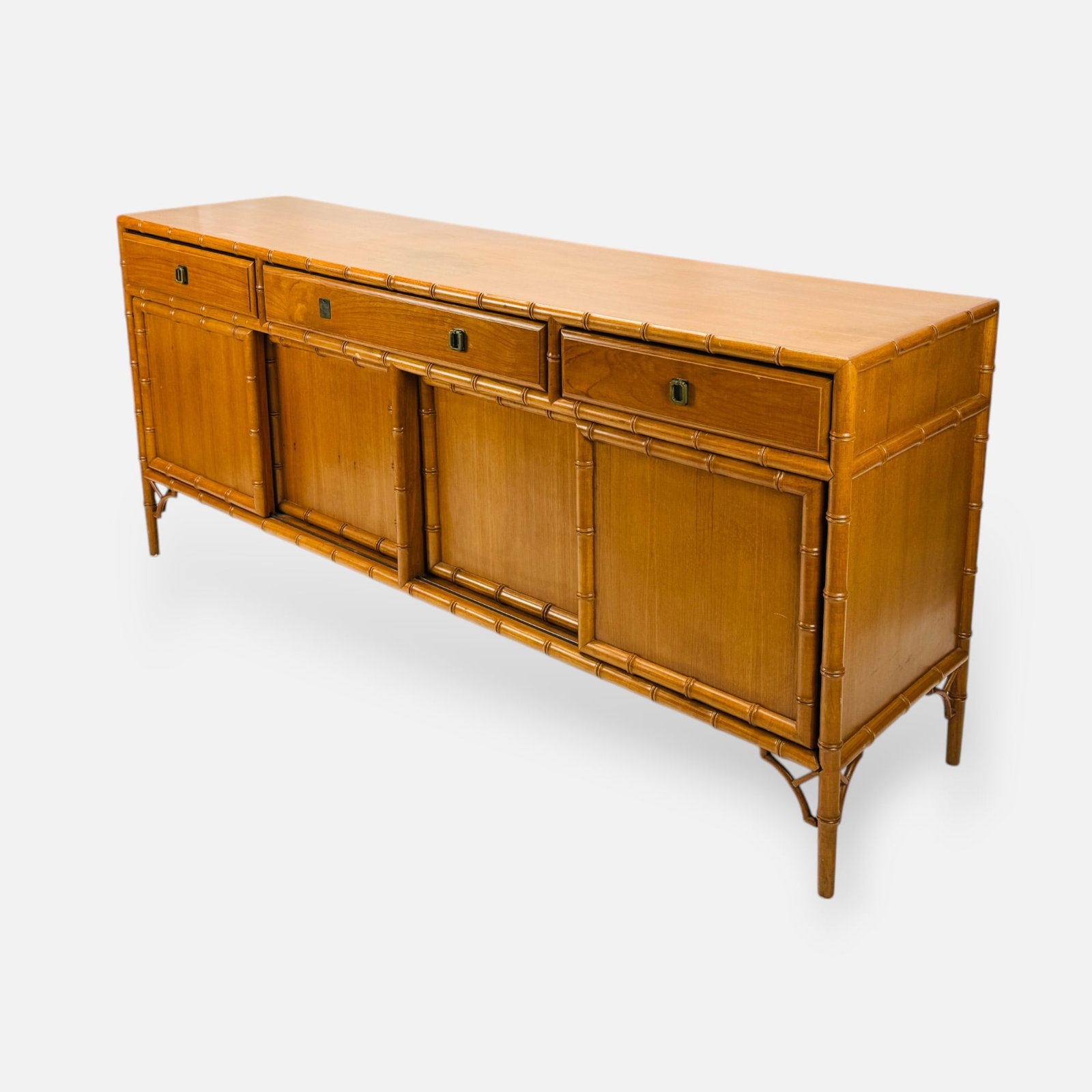 Chinese Chippendale Style Faux Rattan Carved Wood Sideboard: Ca. second half 20thC. No missing components, no major breaks or repairs. Retains original finish and patina, with occasional seam separations and surface scuffs. Minor water staining to surface.