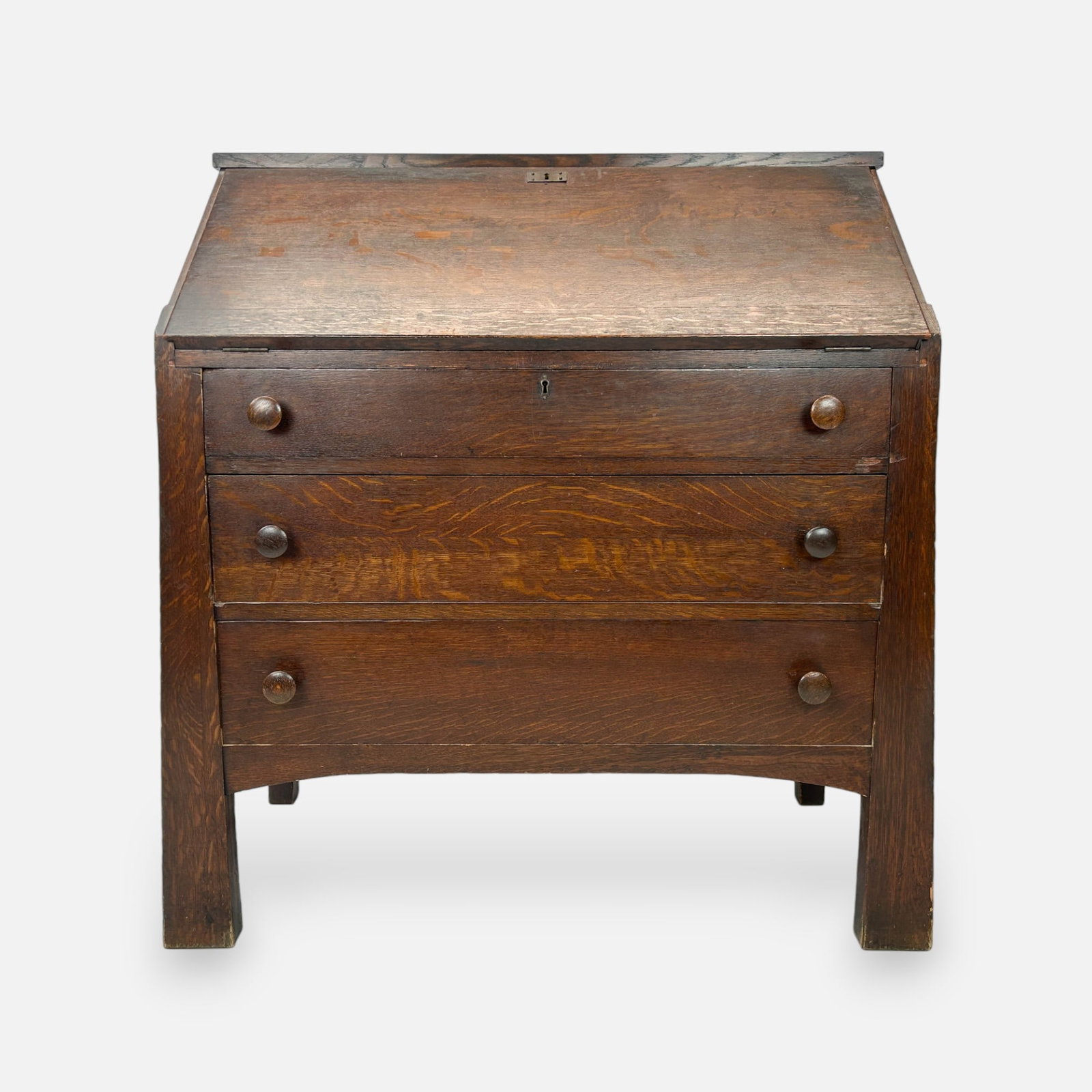 W. B. Moses & Sons Arts & Crafts Mission Oak 3-Drawer Slant-Front Desk: Ca. early 20thC. See pinned manufacturers tag. Good overall condition, with age-appropriate surface scuffs and scratching, and discoloration to interior desk surface.
