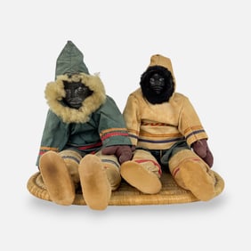 Native American Carved Stone Inuit Dolls on Rattan Stand