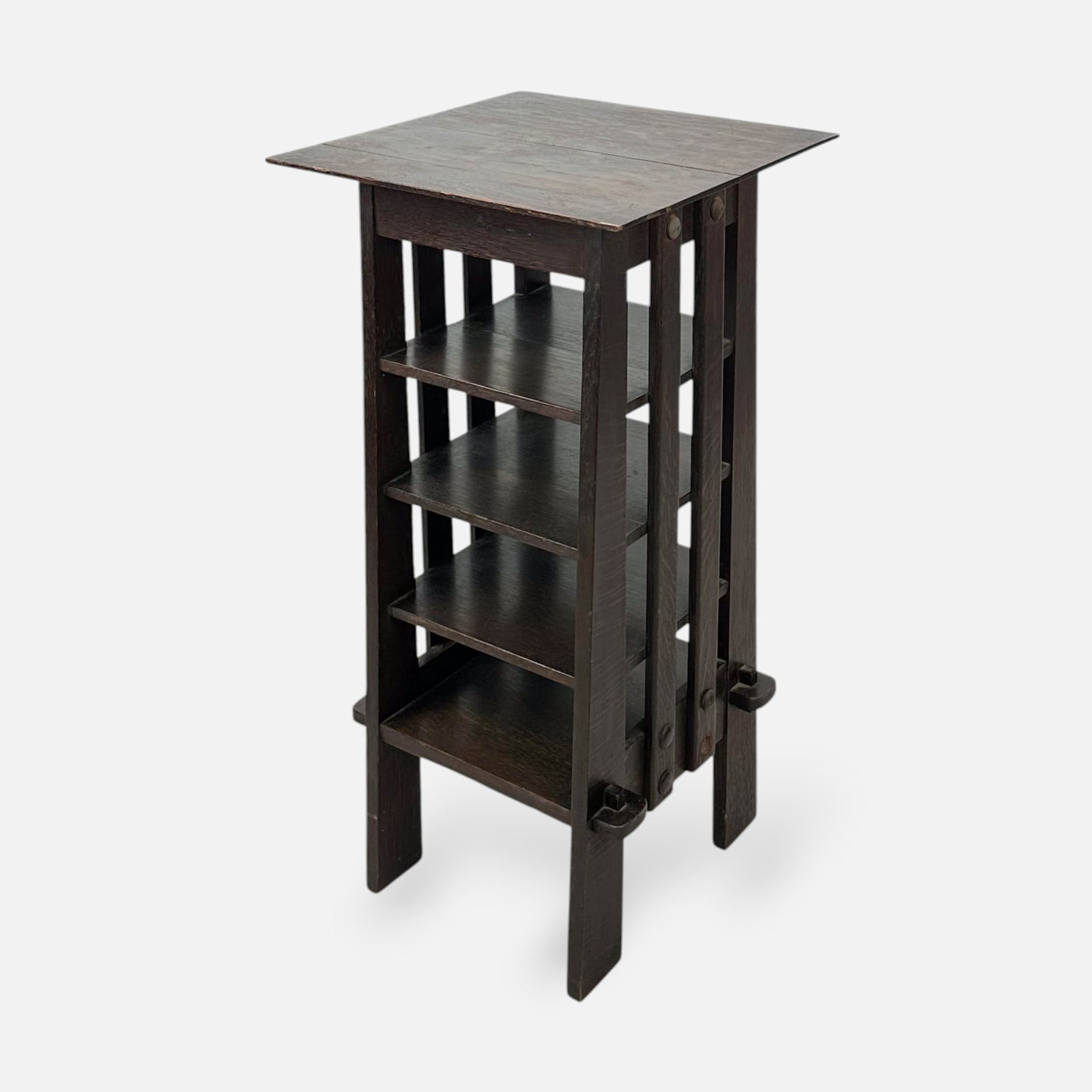 Michigan Chair Co Arts & Crafts Mission Oak Magazine Rack Stand: Ca. early 20thC. Apparently unmarked. Good age-appropriate condition, with minor scuffs, scratches, apparent repaired loose board on table top, shown missing peg.