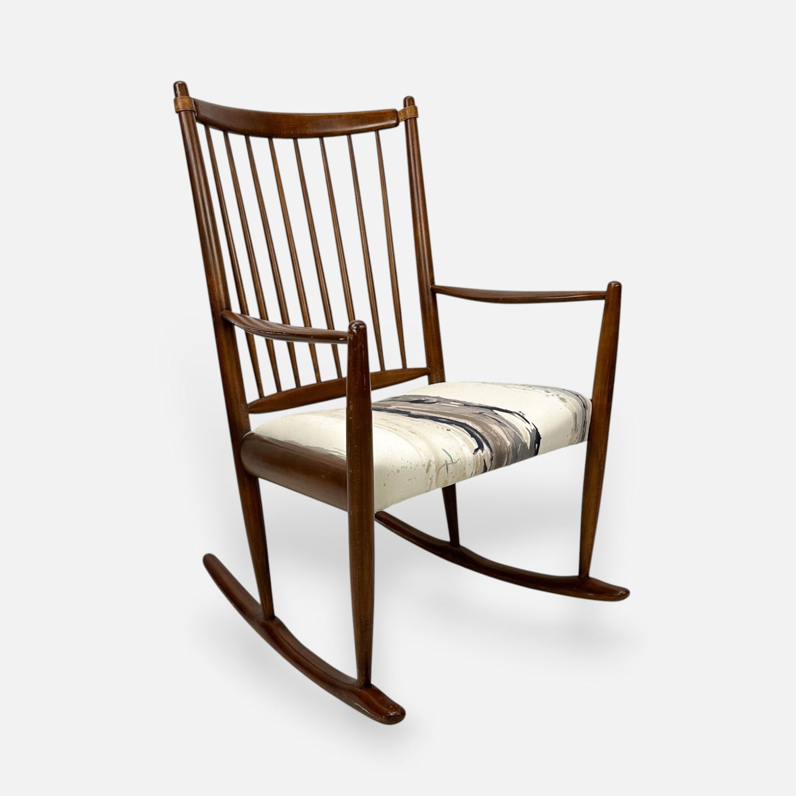 Niels Eilersen Danish Modern MCM Teak Rocking Chair: Good overall condition, with age-appropriate wear, light scuffs and scratches.