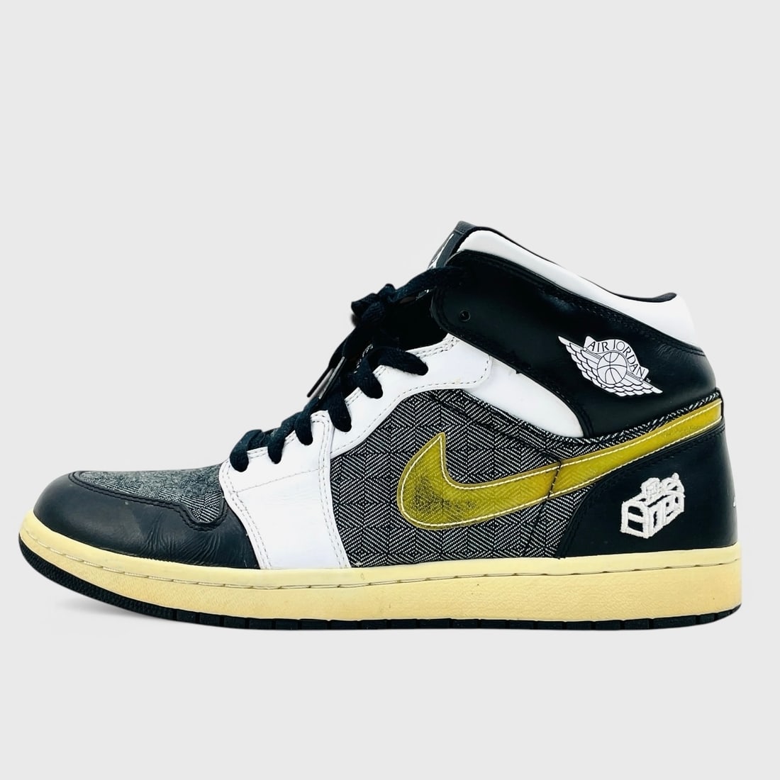 Air Jordan 1 Size 11 w/ Black, White, And Gold Herringbone Design w/ Original Box: Air Jordan 1 Sneakers w/ Black And White Leather Upper, Gold Swoosh, Herringbone Patterned Panels, Black Laces, Aged Midsole, Black Rubber Outsole Showing Signs Of Wear, Creasing On Leather, And Origi