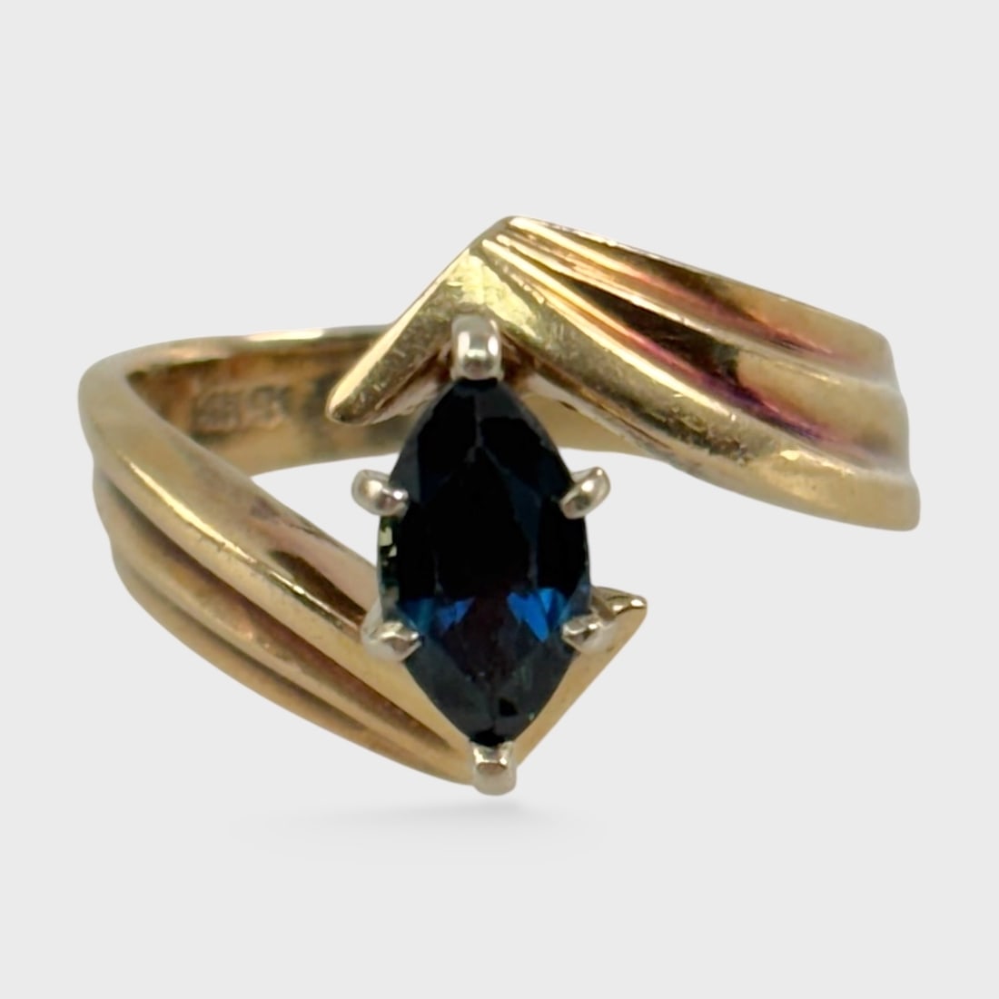 Fine 14K Yellow Gold Blue Sapphire Gemstone Ring Size 5.25: Wear on the stone. Weighs approx. 5 grams. Stone measures approx. 4.5 mm x 9 mm. We do not provide in-house shipping! We have a partnership with our local UPS Store which offers a simple pack and ship