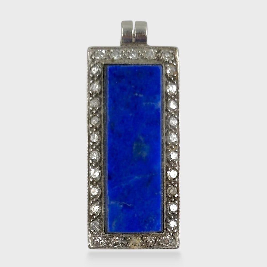 Fine Platinum Lapis Lazuli & Diamond Pendant: Weighs approx. 4.8 grams. Measures approx. 1" x 3/8" We do not provide in-house shipping! We have a partnership with our local UPS Store which offers a simple pack and ship process, please see contact