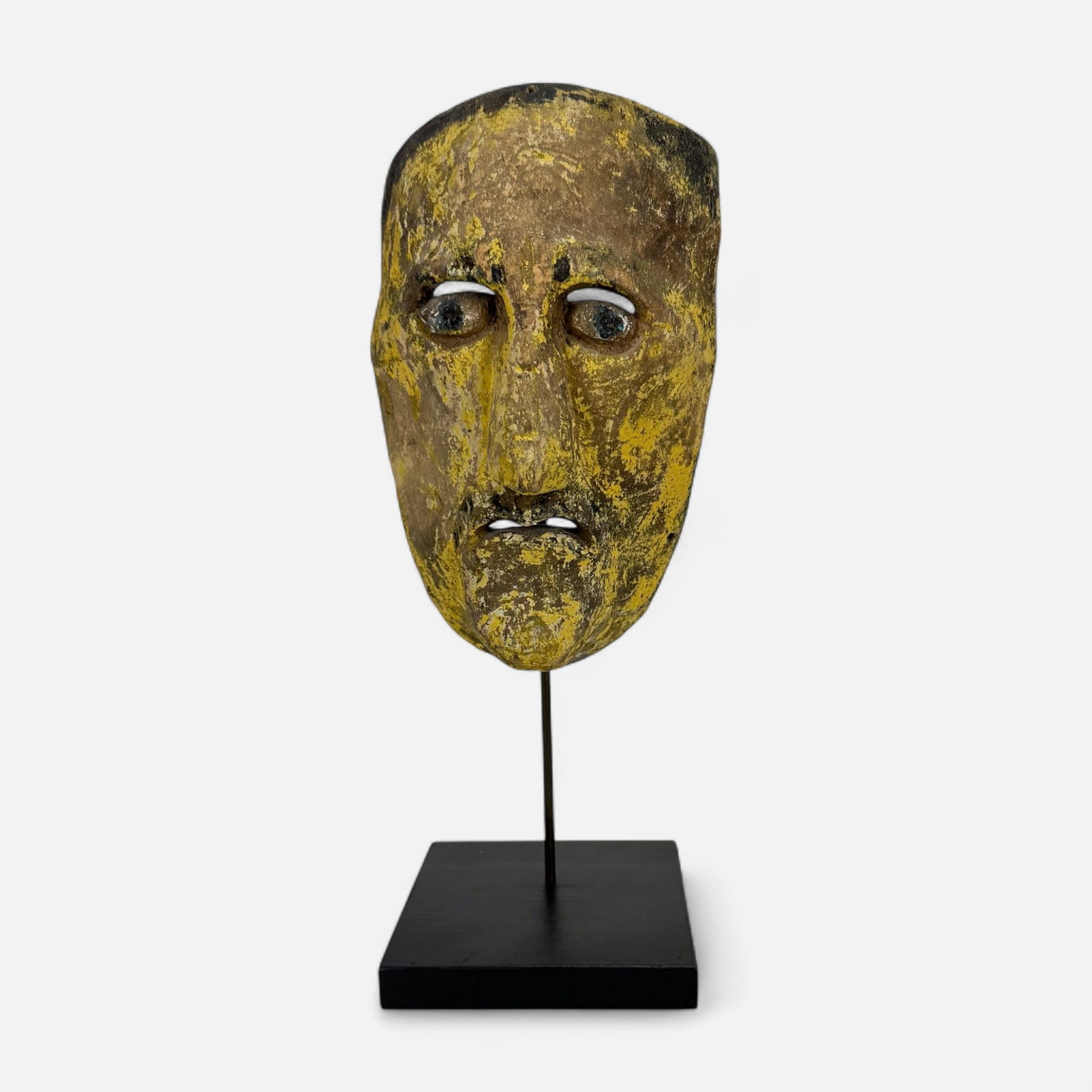 Antique Tribal Carved Gilt Wood Tribal Mask: Fair age-appropriate condition, with shown paint loss. Stand included. Just mask measures approx. 9" x 5 1/4" x 3 1/2". Simple integrated shipping with LiveAuctioneers LiveShipping is now available. B