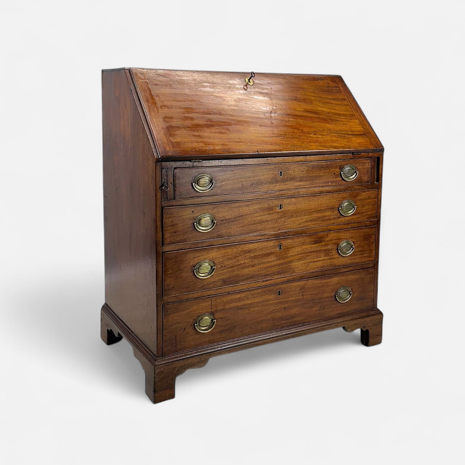 Antique American Mahgany Slant-Front Desk Graduated Cockbeaded Drawers Bracket Feet: Ca. first quarter 19thC. With graduated cockbeaded drawers, bracket feet, replaced hardware. Good age-appropriate condition, sturdy and solid construction, repair to top back left corner, see photos. 