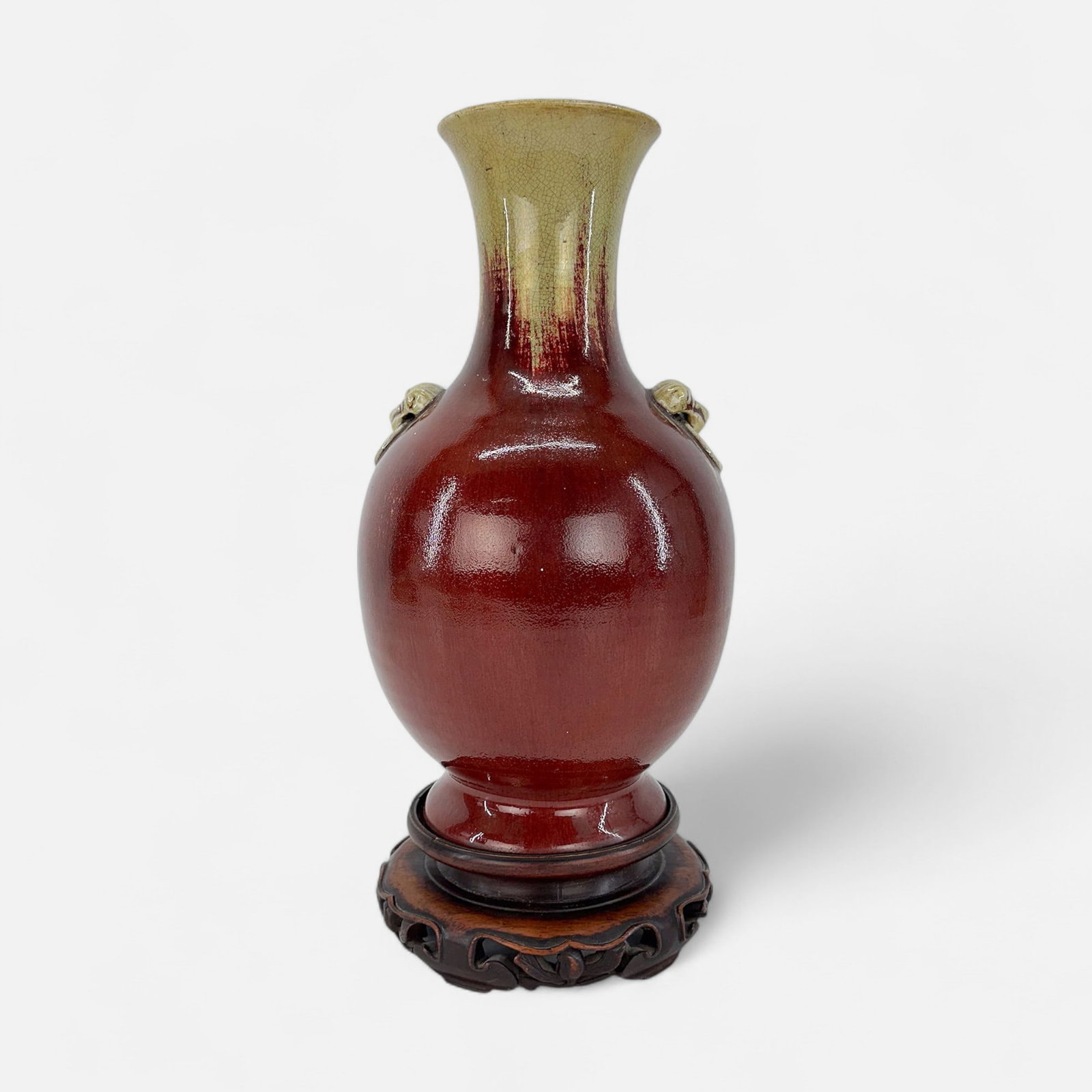 Antique Chinese Sang de Bouef Oxblood Vase w/Applied Foo Dog Head Decoration: Very good age-appropriate condition. Included measurements for vase not including base. Base with minor repairs. Base measures approx. 2 1/2" x 7 1/4". Simple integrated shipping with LiveAuctioneers 