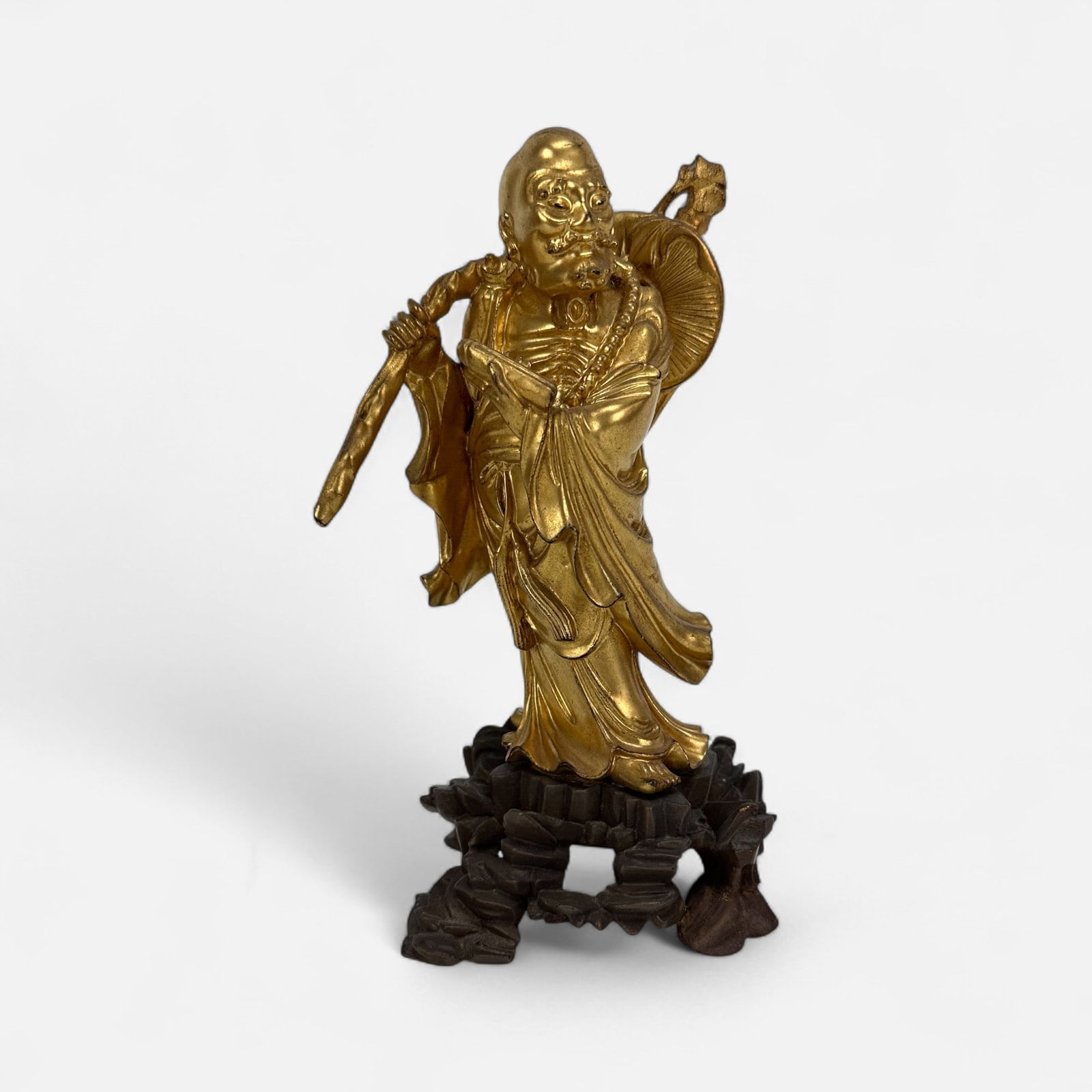 South East Asian Wandering Monk Carved Gilt Wood Sculpture: Very good with minor surface gilt loss. Simple integrated shipping with LiveAuctioneers LiveShipping is now available. Bidders may still arrange their own shipping which may be more economical, please