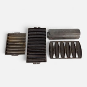 Four Griswold & Wagner Cast Iron Bread Pans