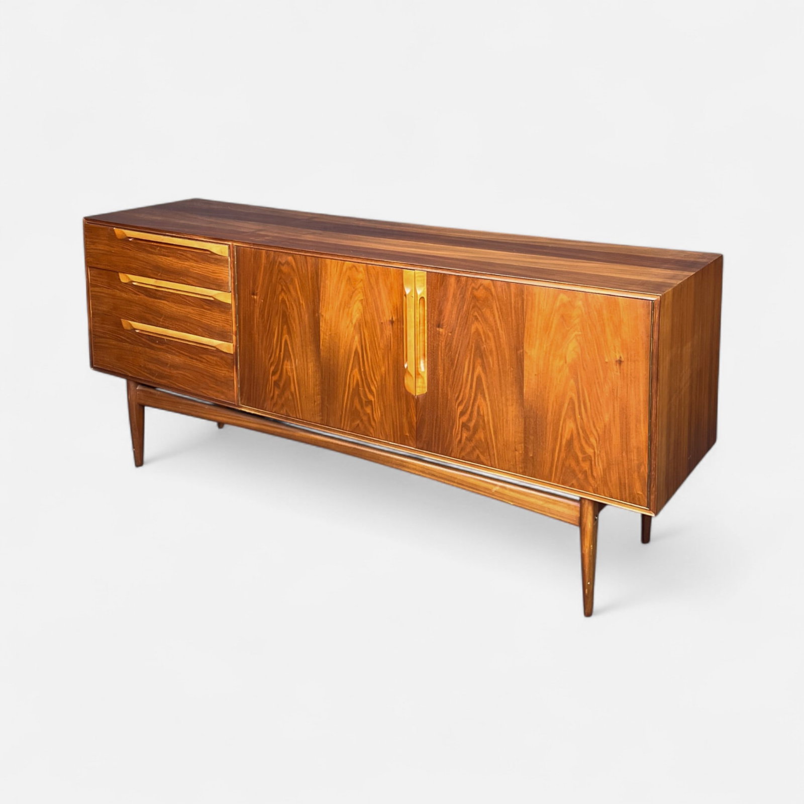 A.H. McIntosh Mid Century Modern "Eden" Sideboard: Ca. second half 20thC. Good age-appropriate condition as shown, with shown surface scuffs and scratches, see discoloration to top, IMPORTANT: Pickups and shipping for this auction will not begin until