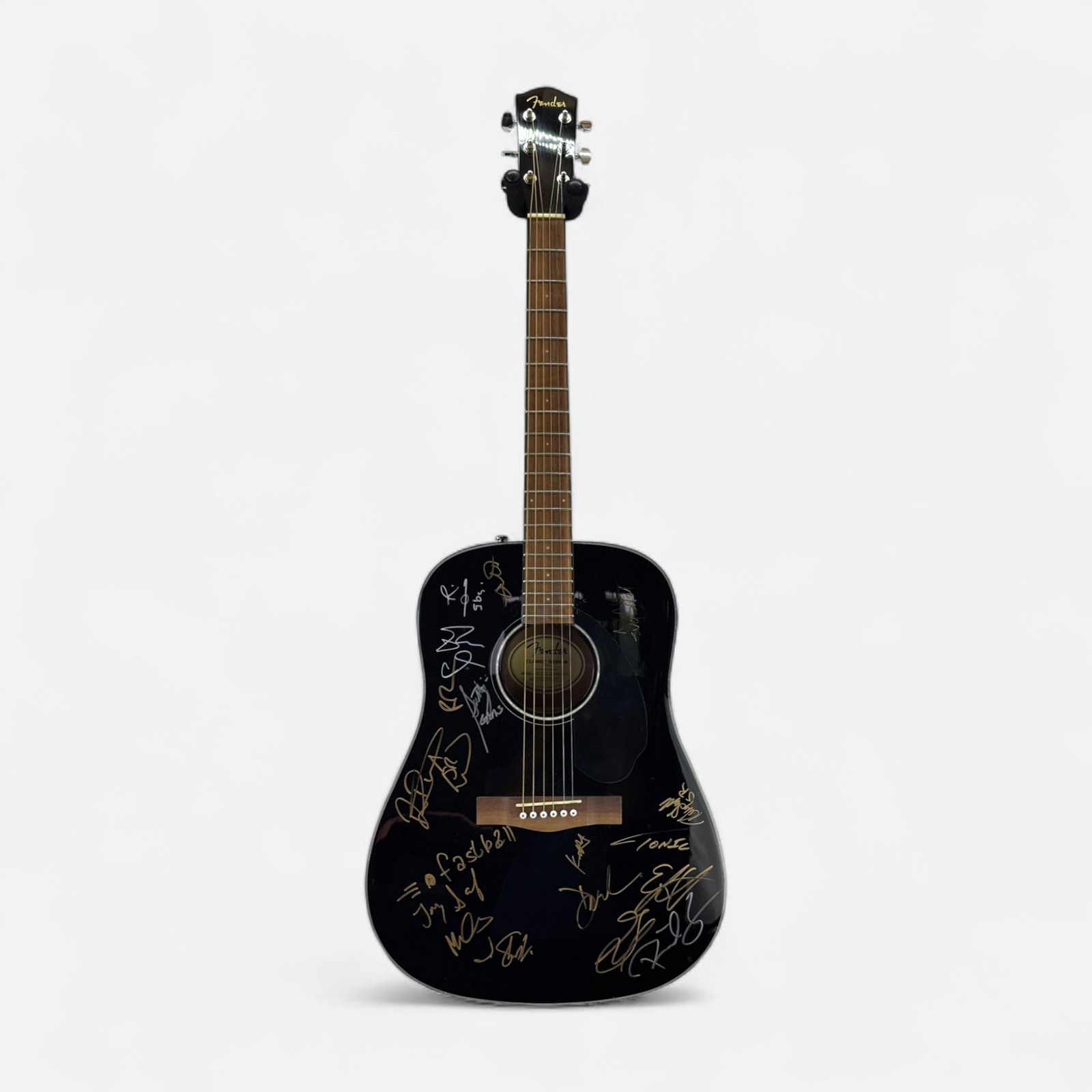 Autographed Fender Dreadnought Guitar: We have no idea who signed this. IMPORTANT: Pickups and shipping for this auction will not begin until after Labor Day. Pickup appointments will be available starting Wednesday, September 3rd.For ship