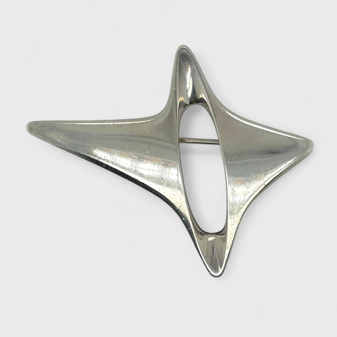 Vintage Georg Jensen Sterling Silver Henning Koppel Designed Brooch #339: Ca. second 20thC. Very good estate found condition, with superficial scratch wear as one would expect. Weighs 22.4 grams. Measures approx. 2 3/8 inches x 1 7/8 inches. Measures approx. 1 1/8 inches th