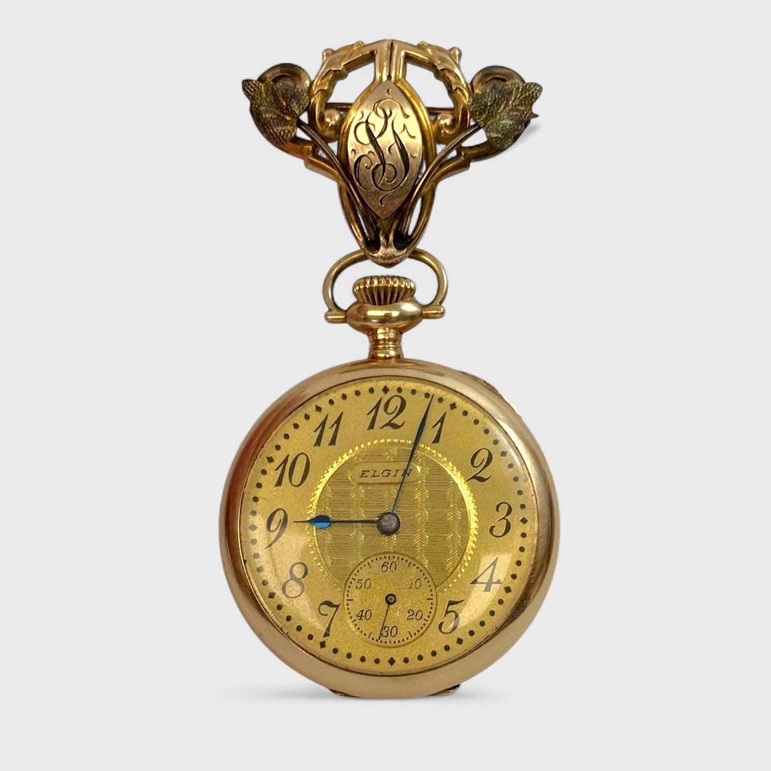 14K Yellow Gold Medium Size Elgin Ladies Watch w/Brooch Hanger: Approx. 30mm diameter. Currently in good running condition, no guarantee for accuracy. Condition of case, dial, and movement are all in good condition with age-appropriate wear. The condition of the g