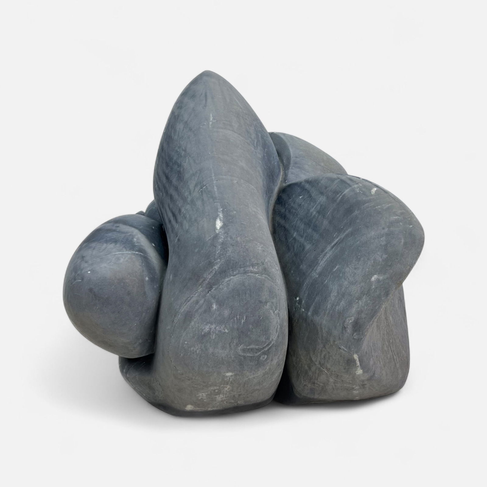 Helaine Blumenfeld "Metamorphosis" Modernist Carved Biomorphic Marble Sculpture: Good overall, with no chips or cracks. This was displayed as a prominent feature in a garden, now showing slight algae discoloration, and scuffs/scratches where it contacted the earth. Easily polished