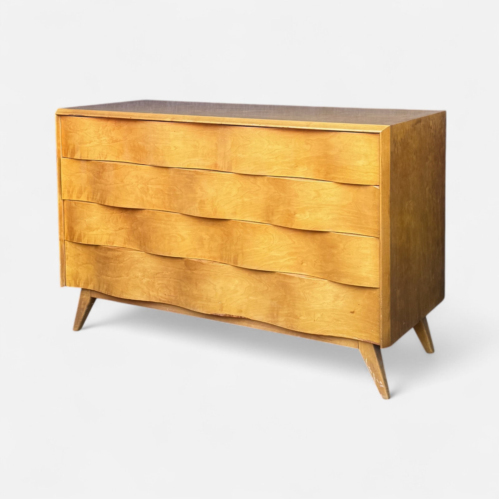 Edmund Spence MCM Birch Wood Wavefront 4-Drawer Low Boy Dresser #1: Ca. mid 20thC. Fair to good condition, see surface scuffs and rubs, scratching, and veneer chipping. Apparently unmarked.For shipping, we highly recommend Donald Camden at UPS Store 4608. Alternativel