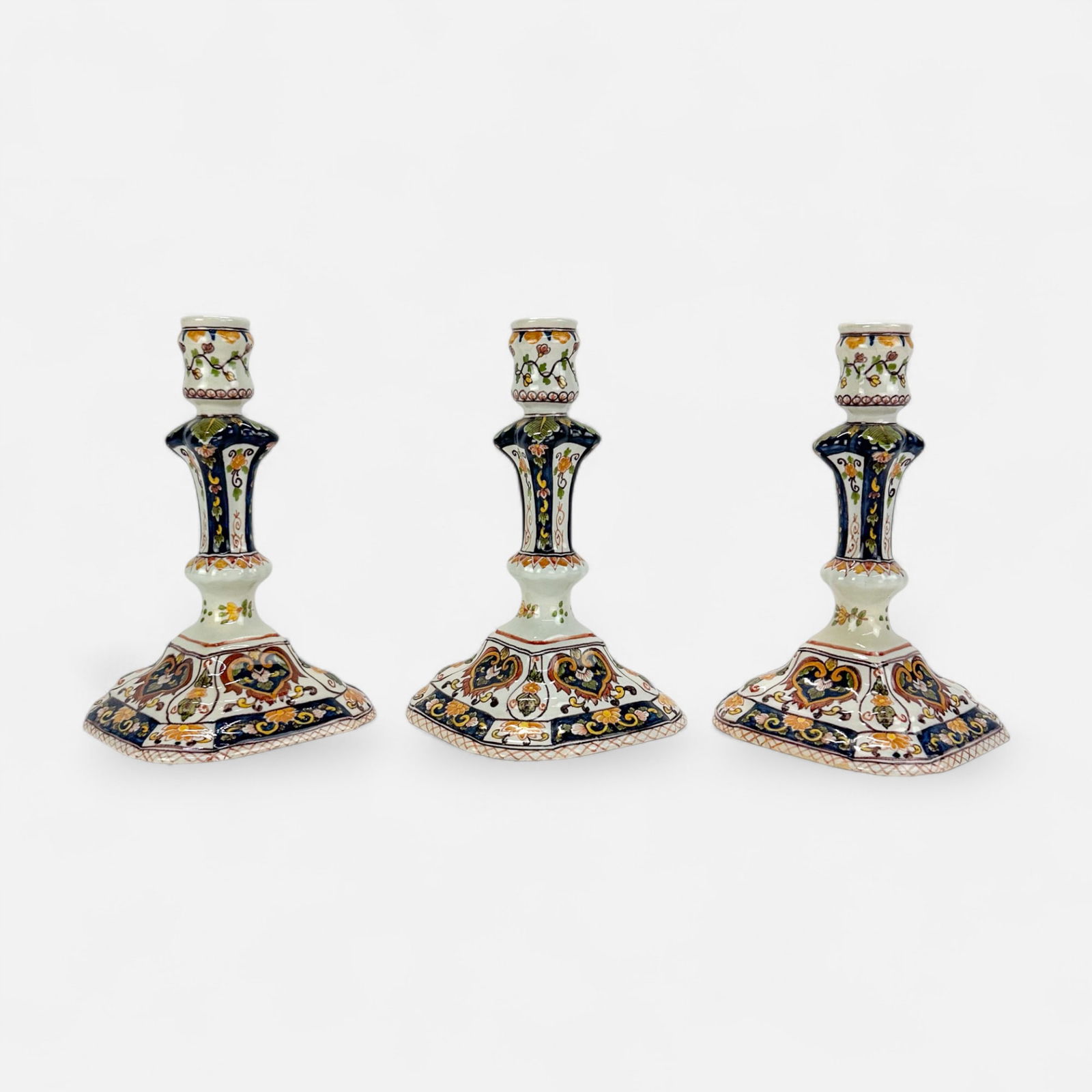 Three Dutch Delftware Royal Tichelaar Makkum Hand Painted Pottery Candlesticks: Ca. first half 20thC. Firing lines on one candlestick, otherwise very good, see photos.For shipping, we highly recommend Donald Camden at UPS Store 4608. Alternatively, reach out to one of our preferr