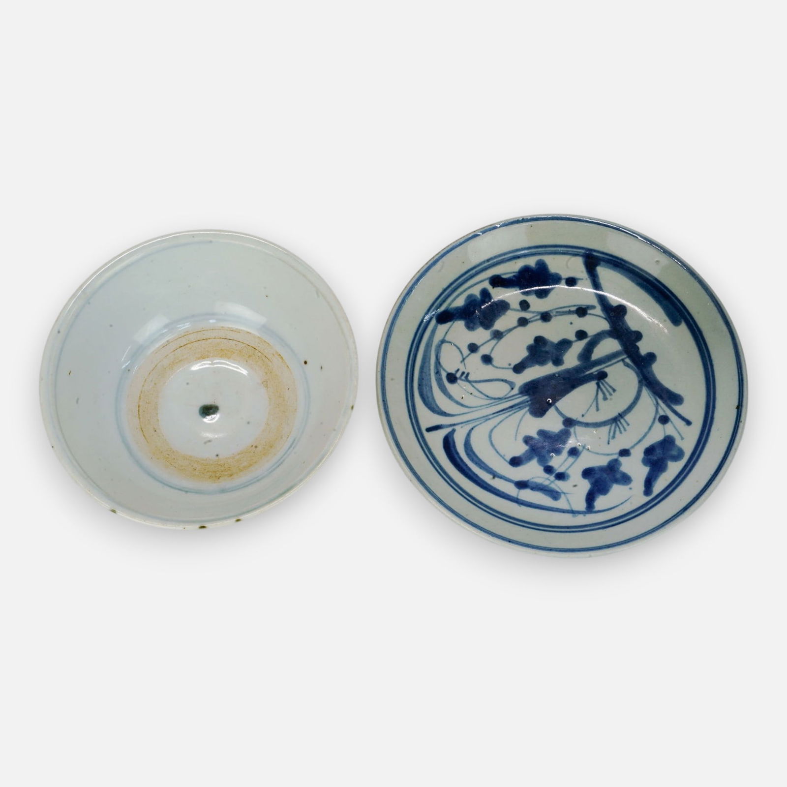 Antique Chinese Blue & White Porcelain/Pottery Bowl and Saucer: Good, with minor surface discoloration. No chips, cracks, or repairs. Bowl measures approx. 2 1/8" x 5", saucer measures approx. 1" x 6 1/8".For shipping, we highly recommend Donald Camden at UPS Stor