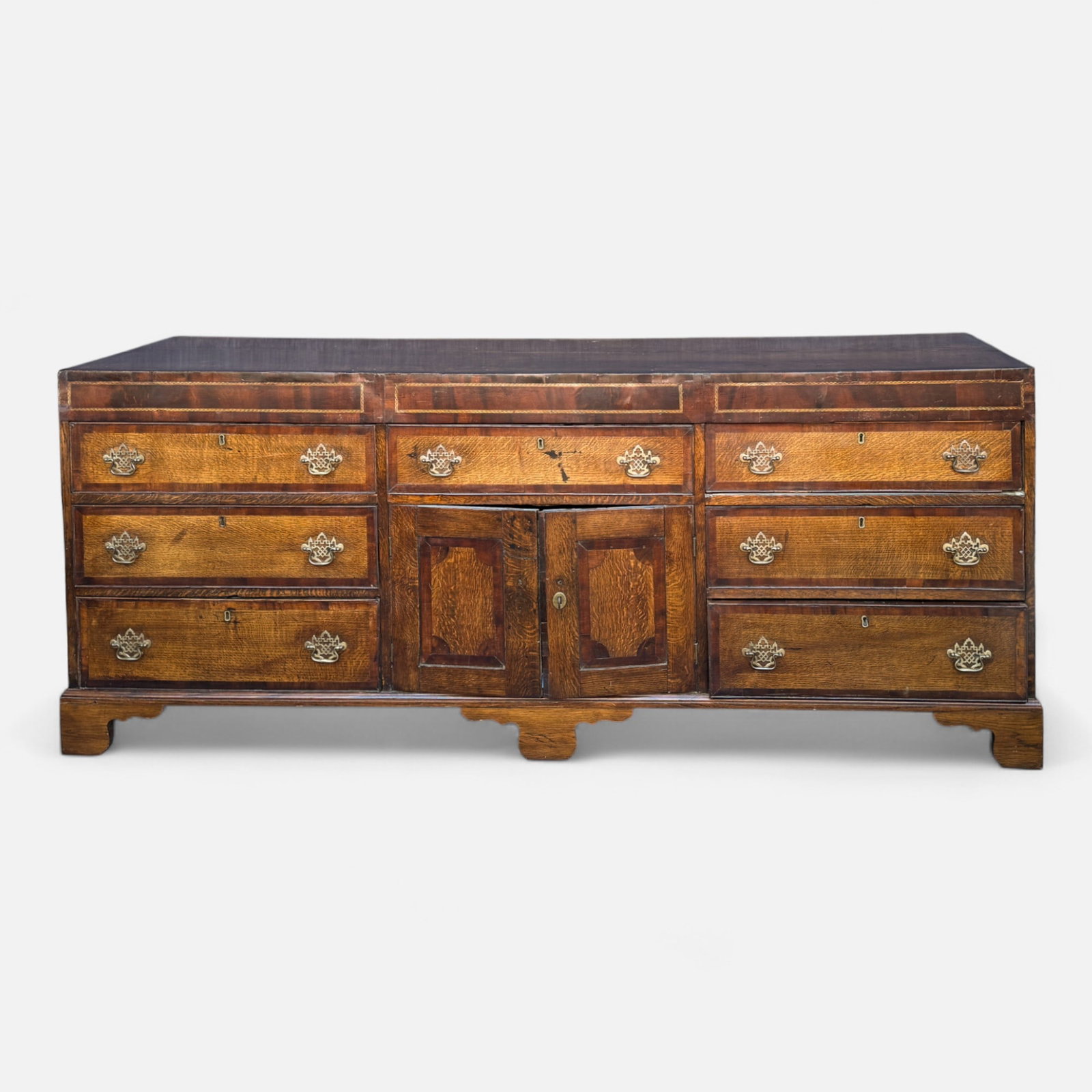 Antique 19thC English Oak & Mahogany Inlaid Double-Dresser Base: Ca. late 18th to early 19thC. Fair condition as shown, age-appropriate wear, discoloration, minor repairs. A few pieces need glue, see photos. Lowest drawer appears warped and will not fully shut. For