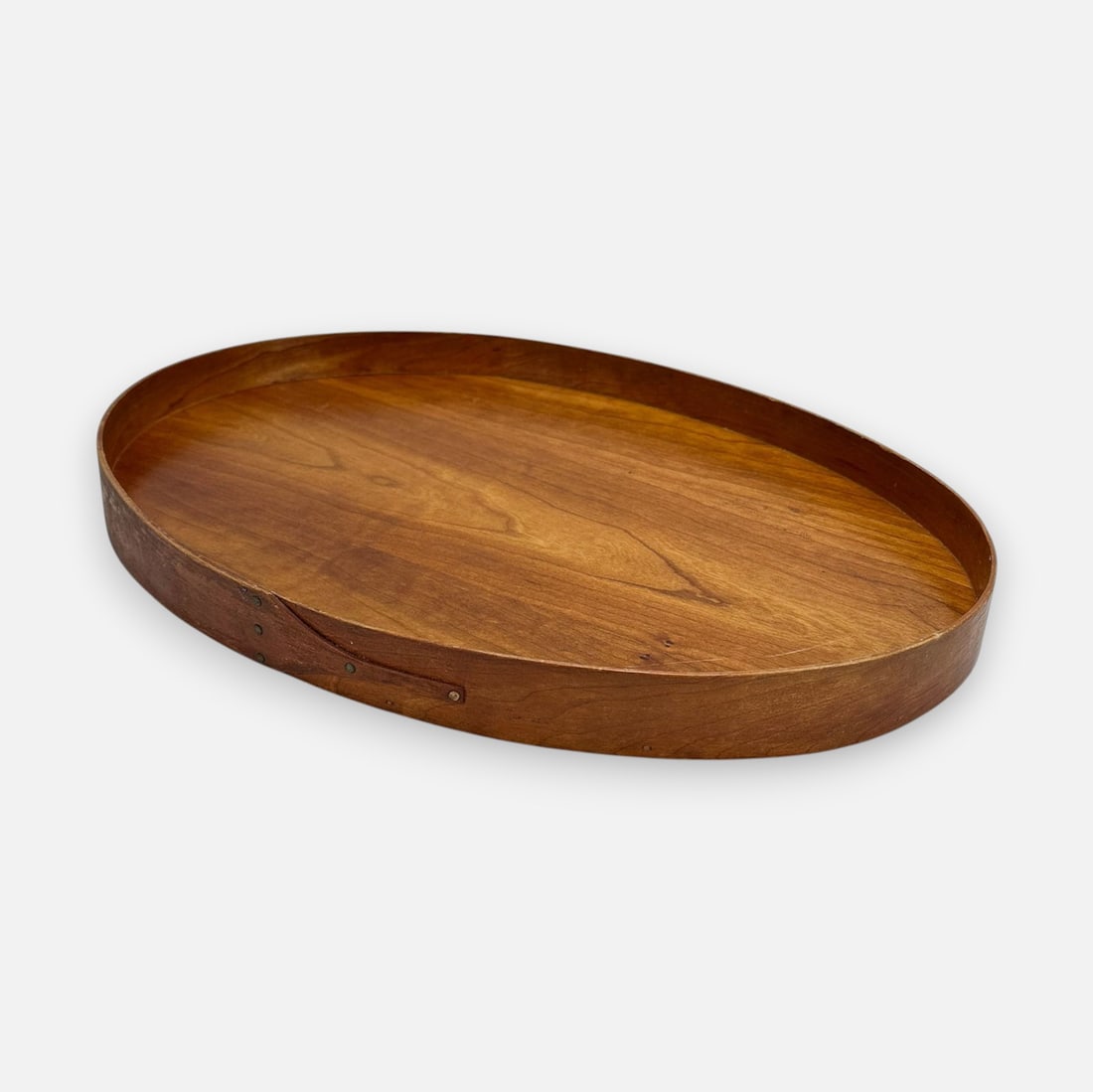 Fine 20thC Shaker Oval One Finger Wood Tray w/Copper Rivets: Ca. mid 20thC. Good condition as shown, with minor scratches. For shipping, we highly recommend Donald Camden at UPS Store 4608. Alternatively, reach out to one of our preferred shippers listed at the