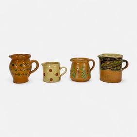 Group of Four French Pottery Pitchers