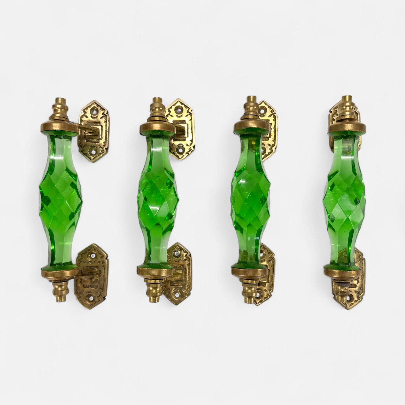 Four Antique Green Glass and Brass Handles: For shipping, we highly recommend Donald Camden at UPS Store 4608. Alternatively, reach out to one of our preferred shippers listed at the link below or elect for LiveShipping in the checkout screen. 