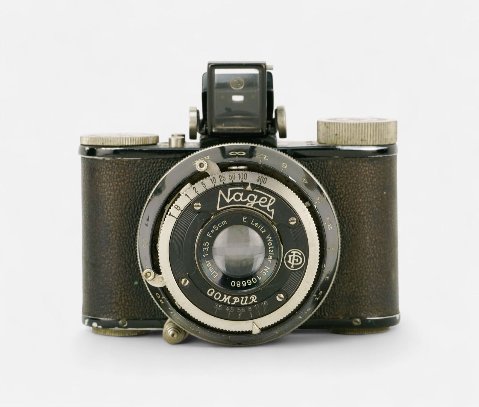 Nagel Pupille Film Camera w/Elmar 50mm Lens: Ca. first half 20thC. Used condition as shown, untested.For shipping, we highly recommend Donald Camden at UPS Store 4608. Alternatively, reach out to one of our preferred shippers listed at the link