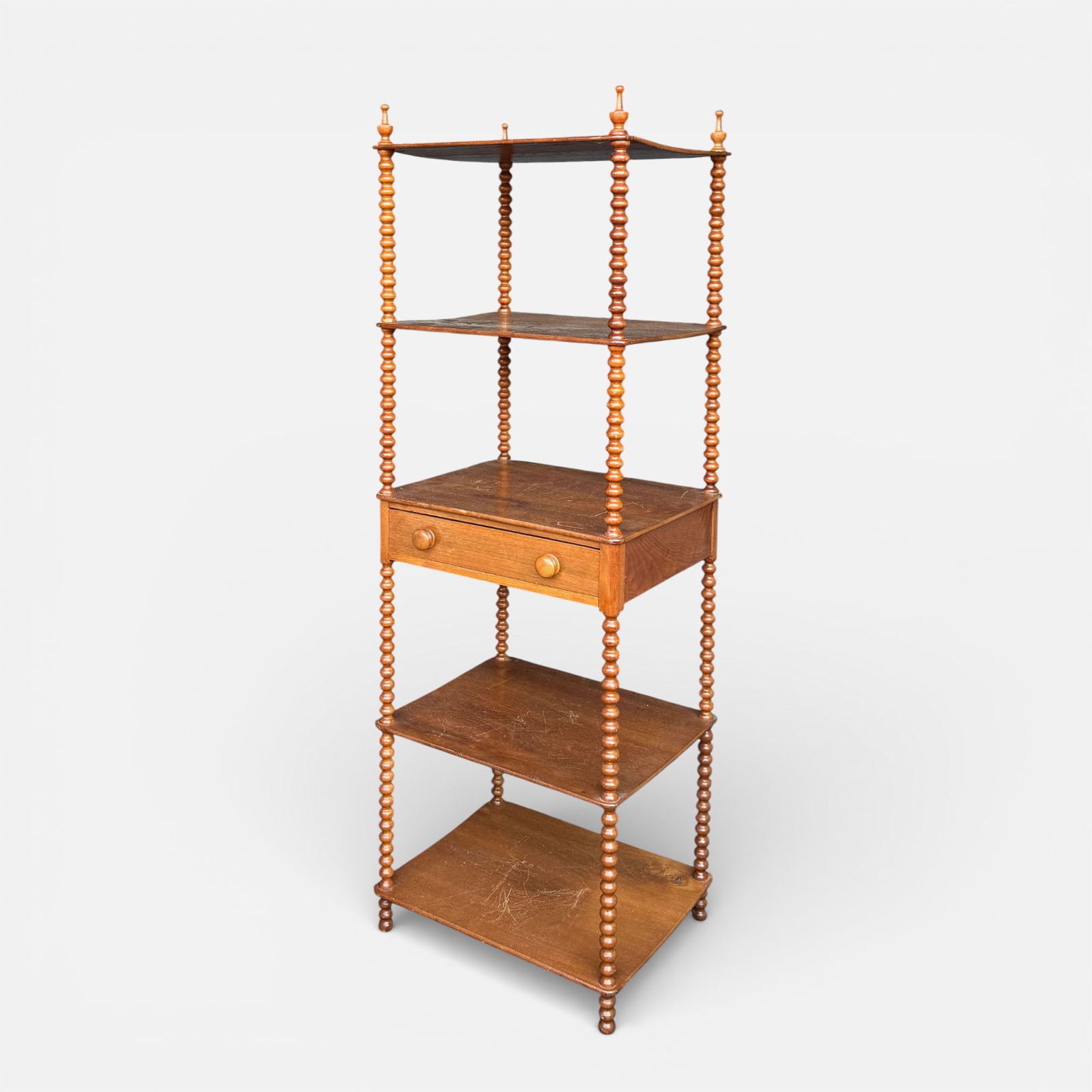 Antique 19thC American Five-Tier Carved Walnut Wood Etagere w/Turned Posts: Ca. last half 19thC. Fair to good age-appropriate condition, with surface scuffs, discoloration, minor bends to planks.For shipping, we highly recommend Donald Camden at UPS Store 4608. Alternatively,