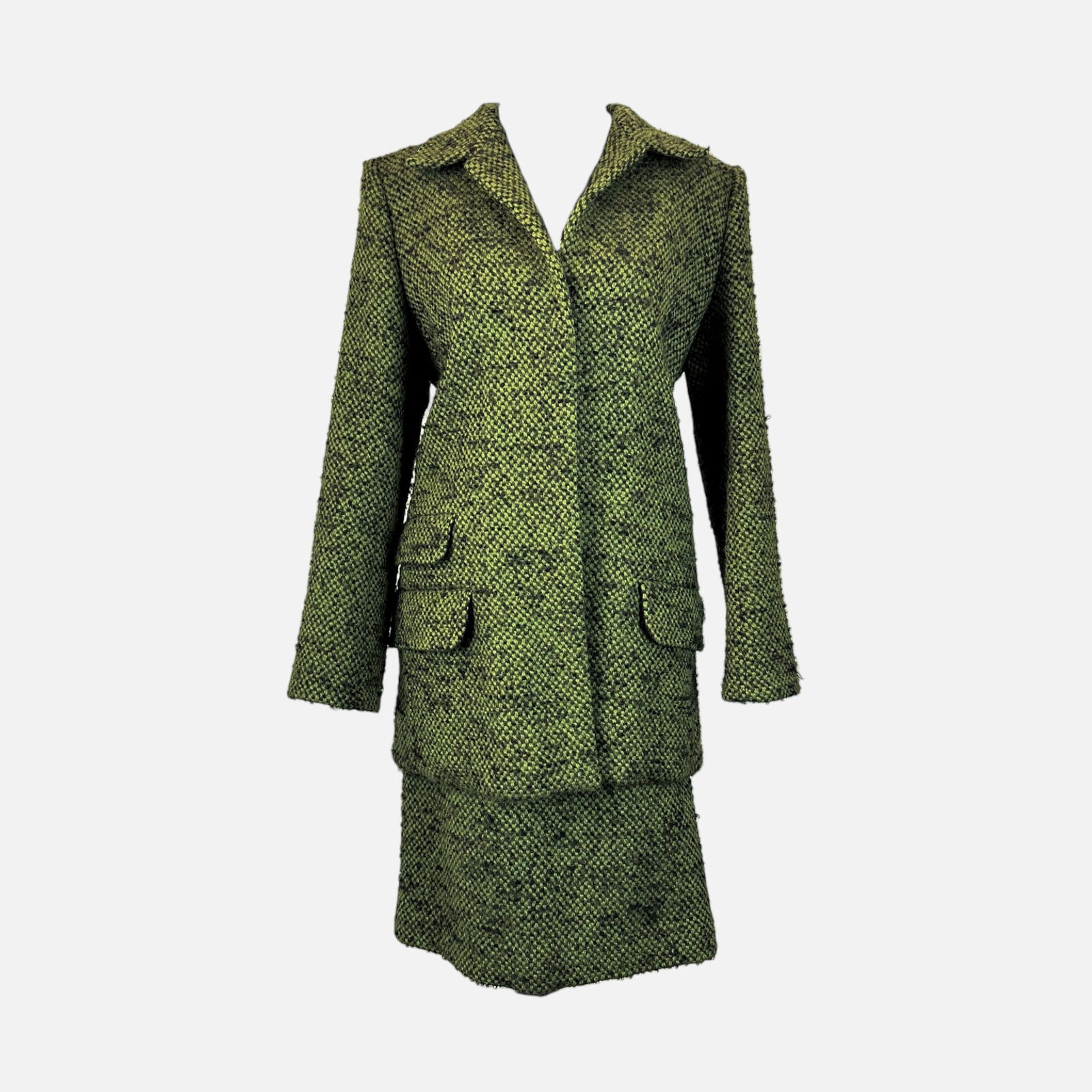 Vintage YSL Yves Saint Laurent Tweed Green Two-Piece Suit: Rive Gauche, made in France. Very good condition, minor pilling but easy to address. Fabric Content: 75% Laine-Wool, 23% Mohair-Mohair, 2% Polyamide-Nylon. Top measures 29.5 inches long, 18 inches at