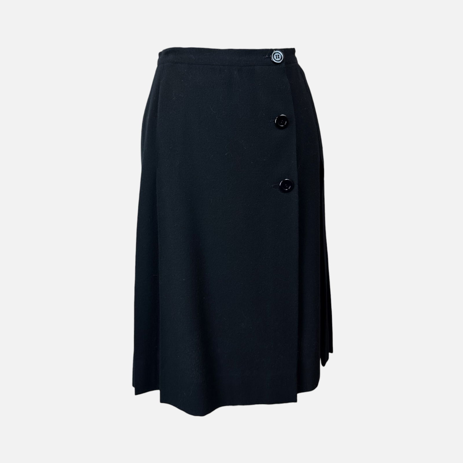 Vintage YSL Yves Saint Laurent Black Pleated Skirt: Rive Gauche, made in France. Very good condition. Fabric tag is missing. Measures 23 inches long and 14 inches at the waist. Size 40. For shipping, we highly recommend Donald Camden at UPS Store 4608.