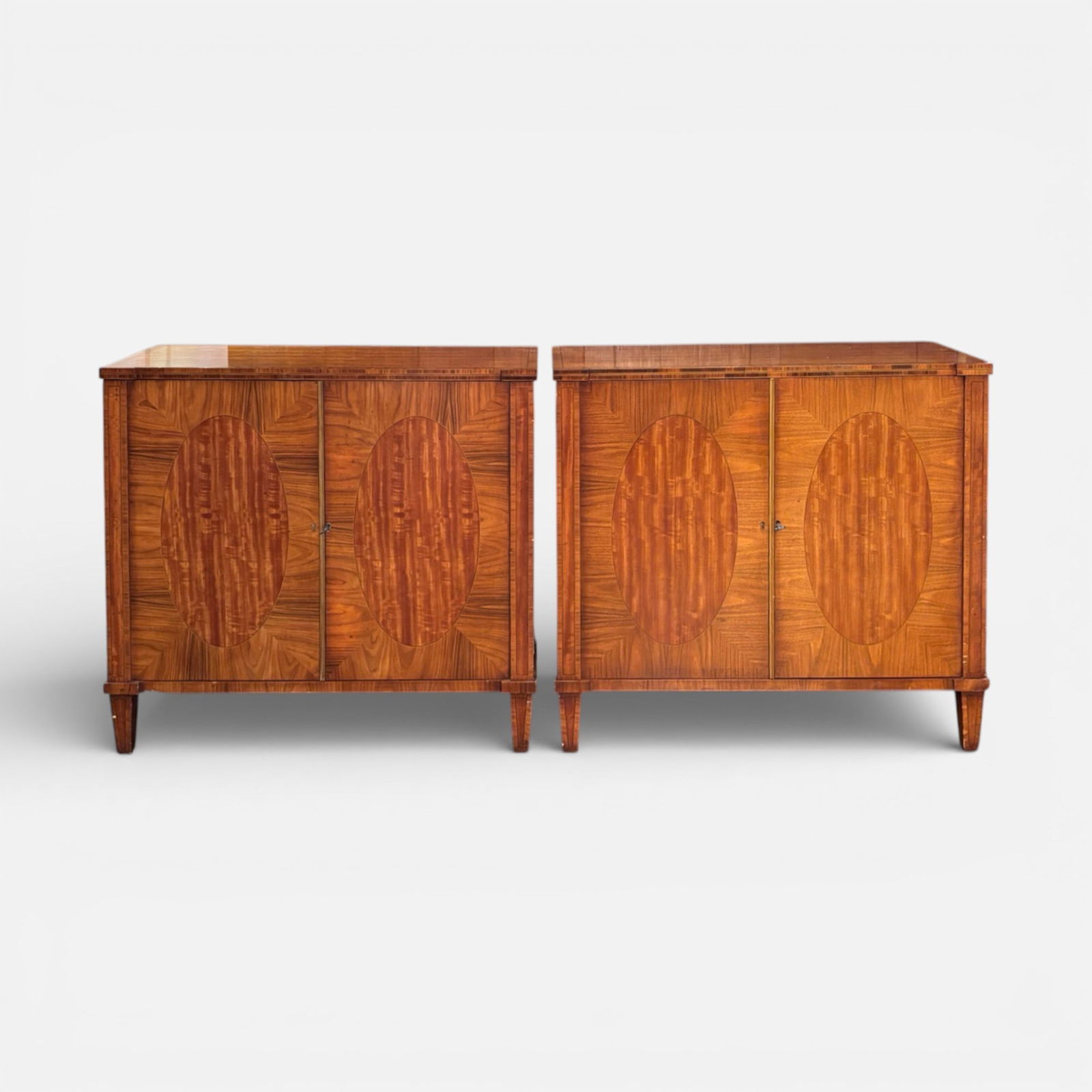Pair Contemporary Hardwood Marquetry Two-Door Cabinets with Shelves: Good overall, see photos of wear.For shipping, we highly recommend Donald Camden at UPS Store 4608. Alternatively, reach out to one of our preferred shippers listed at the link below or elect for Live