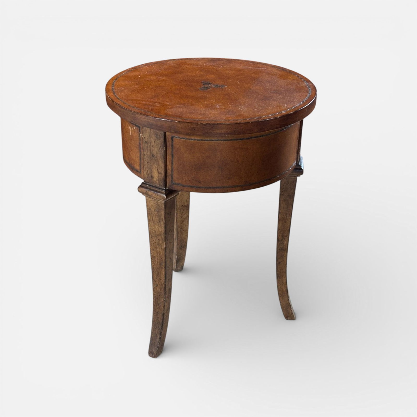 Italian Neoclassical Style Hand Tooled Leather and Wood Drum Table: Ca. last half 20thC. Very good condition with no apparent breaks or repairs. For shipping, we highly recommend Donald Camden at UPS Store 4608. Alternatively, reach out to one of our preferred shipper