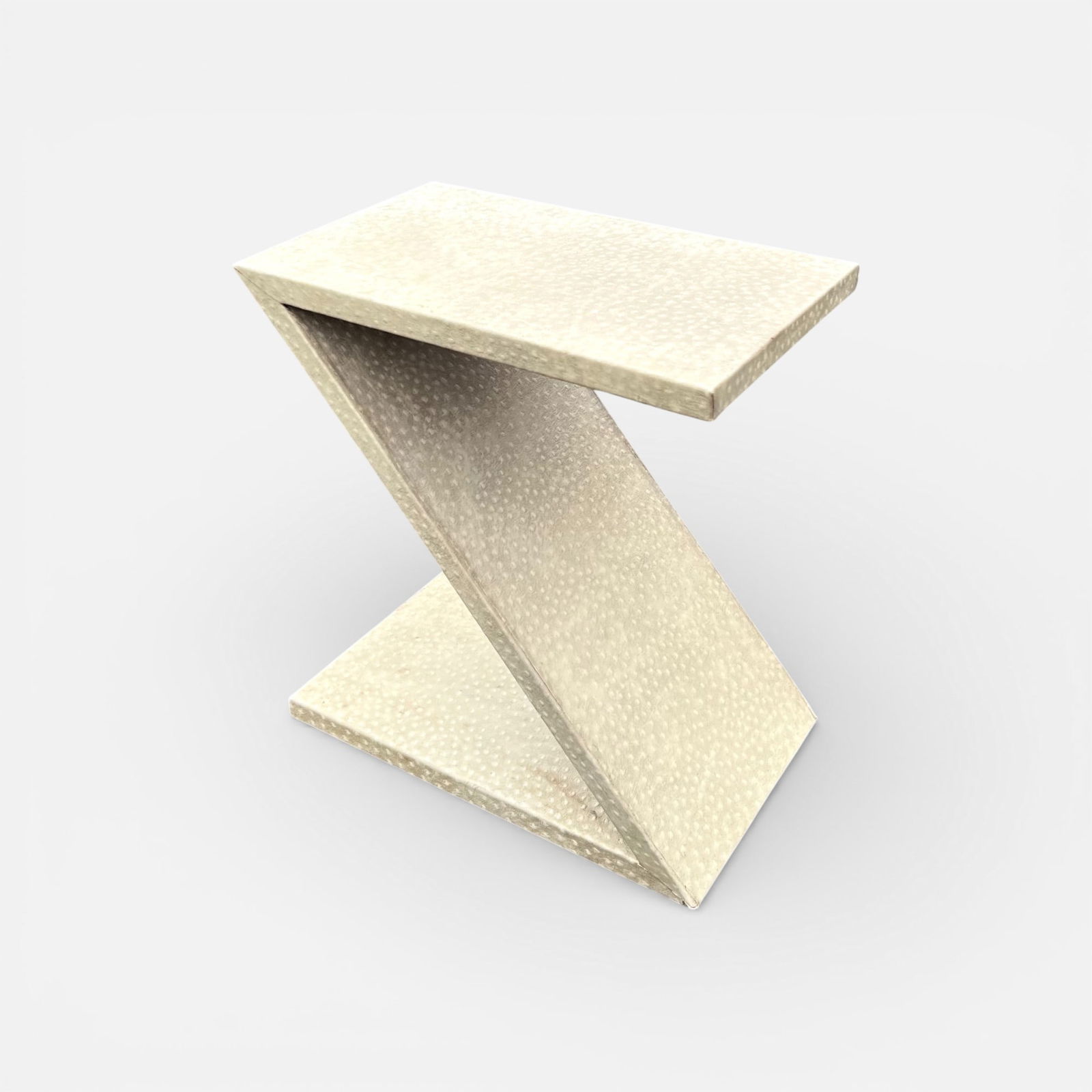 Ostrich Leather Wrapped Z-Shaped Side Table: Good with minor spots of wear and discoloration.For shipping, we highly recommend Donald Camden at UPS Store 4608. Alternatively, reach out to one of our preferred shippers listed at the link below or