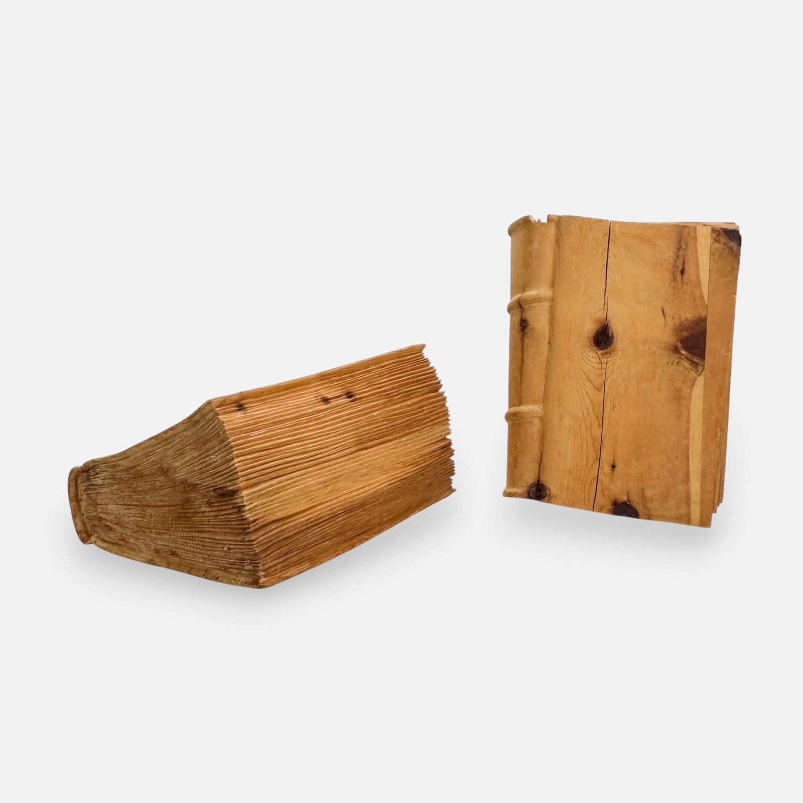 Ermenegildo Pannocchia Pair Carved Wood Books Italian Realism Sculptures #2: Ca. 1990s. Ermenegildo Pannocchia (Italian, b. 1954). Purchased Galleria Graziussi, Venice. Signed to base. Good, with wood splits, minor scuffs.For shipping, we highly recommend Donald Camden at UPS