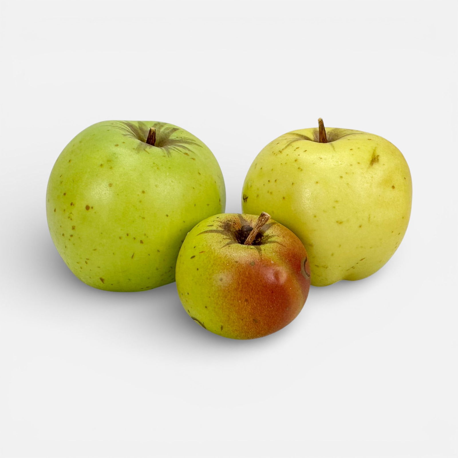 Three Penkridge Realistic Ceramic Apple Fruit Sculptures: Two apples with impressed marks. Largest apple's dimension included in listing.For shipping, we highly recommend Donald Camden at UPS Store 4608. Alternatively, reach out to one of our preferred shipp