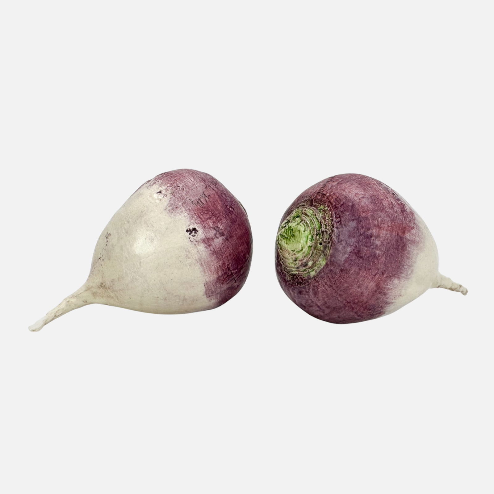 Two Mary Kirk Kelly Realistic Ceramic Radish Root Vegetable Sculptures: Mary Kirk Kelly (American, 1918-2013), each radish signed as shown.For shipping, we highly recommend Donald Camden at UPS Store 4608. Alternatively, reach out to one of our preferred shippers listed a