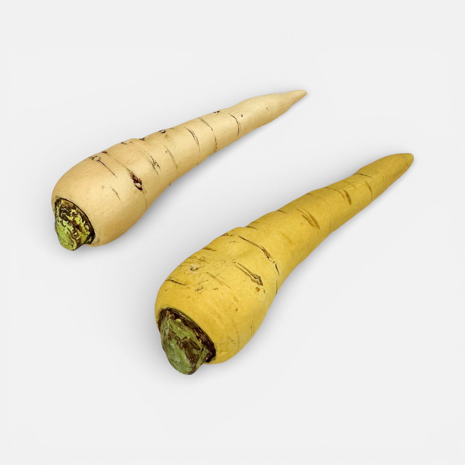 Two Penkridge Realistic Ceramic Parsnip Vegetable Sculptures: One impressed mark as shown.For shipping, we highly recommend Donald Camden at UPS Store 4608. Alternatively, reach out to one of our preferred shippers listed at the link below or elect for LiveShipp