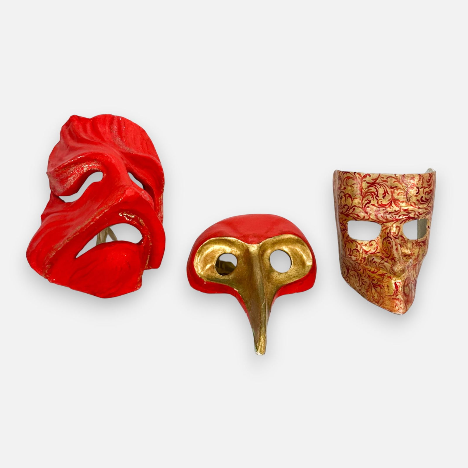 Three 1980s Venetian Masquerade Red and Gilt Gold Painted Paper Mache Grotesque Bird Masks: Two masks signed and dated 1981 and 1982 respectively.For shipping, we highly recommend Donald Camden at UPS Store 4608. Alternatively, reach out to one of our preferred shippers listed at the link be