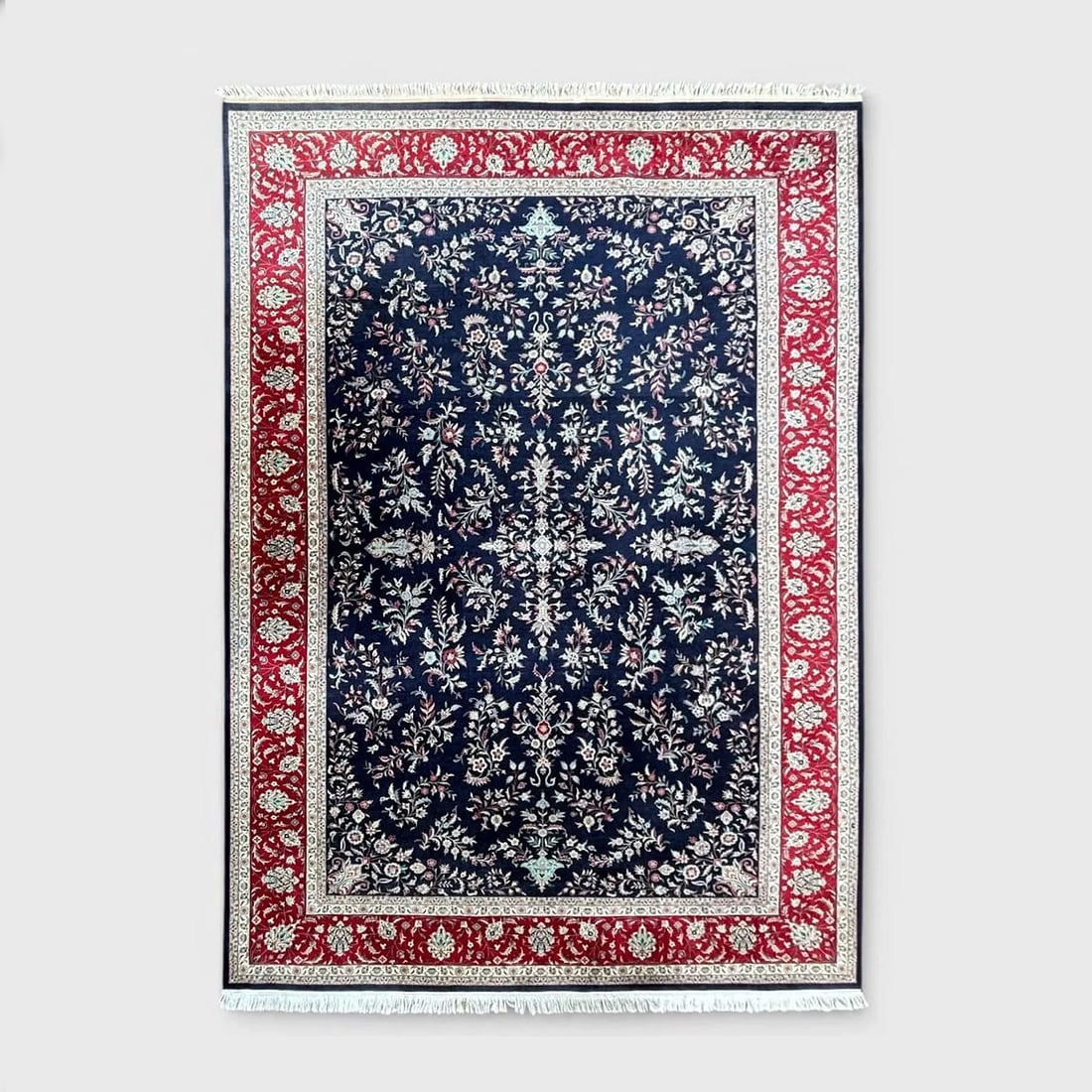 Persian Tabriz Hand-Knotted Wool Room-Size Carpet 18' 2" x 13': Excellent throughout, with very little wear or fading, very supple, even pile throughout, may need cleaning, shows one area of slight discolioration not noticeable on the floor. This rug is in the bes