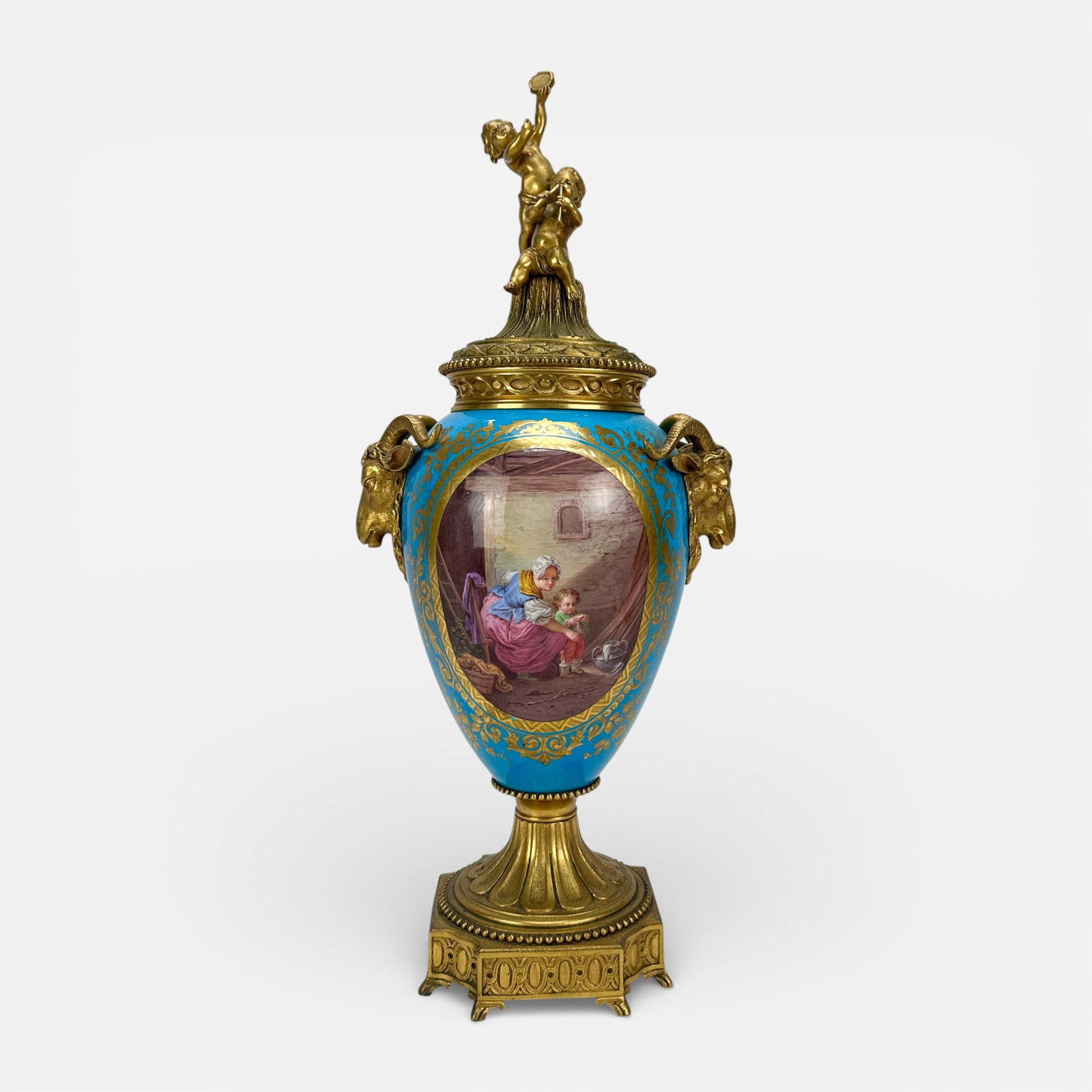 Sevres French Porcelain Urn Painted Landscape Domestic Scenes & Gilt Bronze Ormolu Rams Head Mounts: Very good age-appropriate condition, with no chips, cracks, or repairs.For shipping, we highly recommend Donald Camden at UPS Store 4608. Alternatively, reach out to one of our preferred shippers list