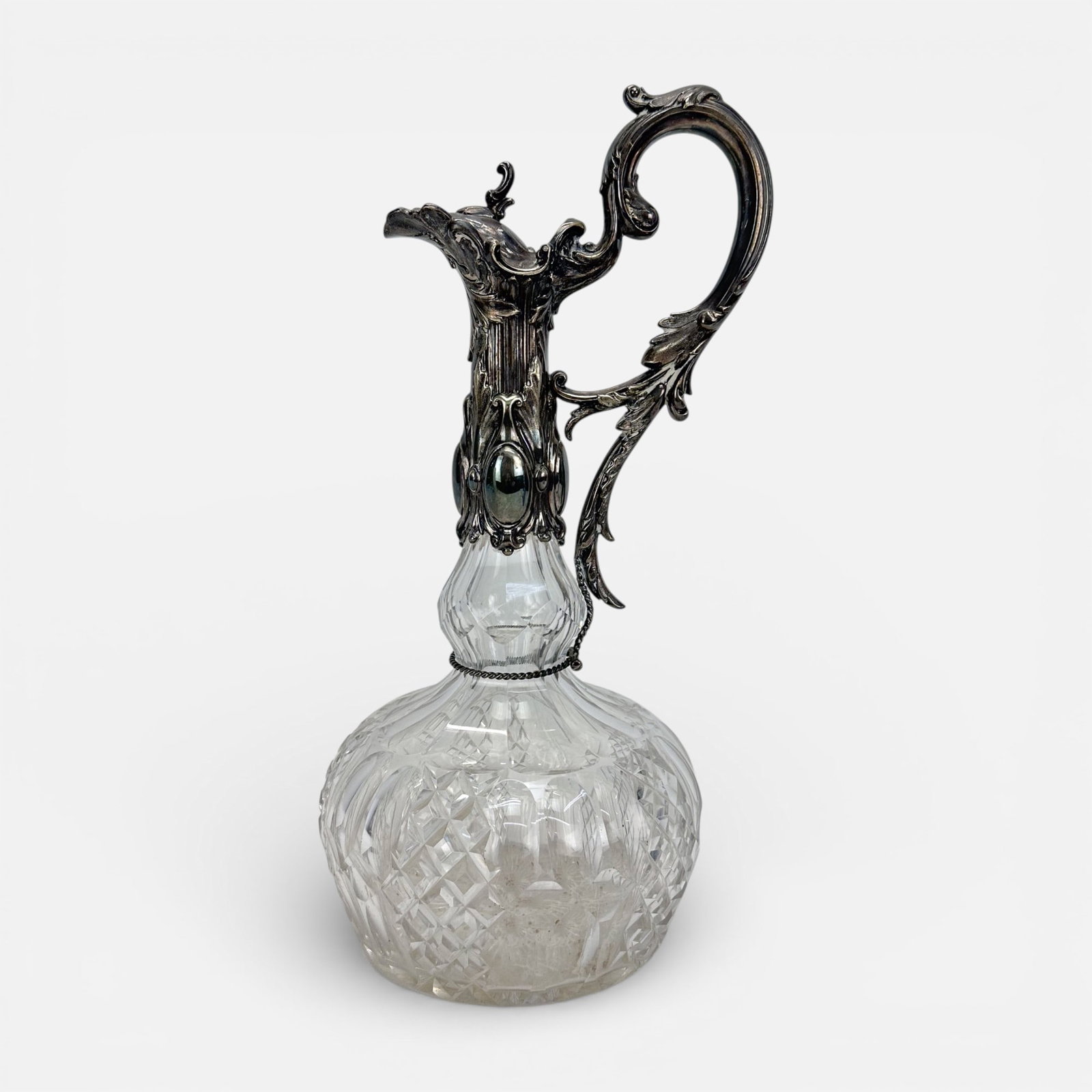 Antique 19thC Art Nouveau Silver and Cut Crystal Claret Jug: Needs cleaning/polishing, possible glass imperfections (please enlarge photos). Otherwise, excellent.For shipping, we highly recommend Donald Camden at UPS Store 4608. Alternatively, reach out to one