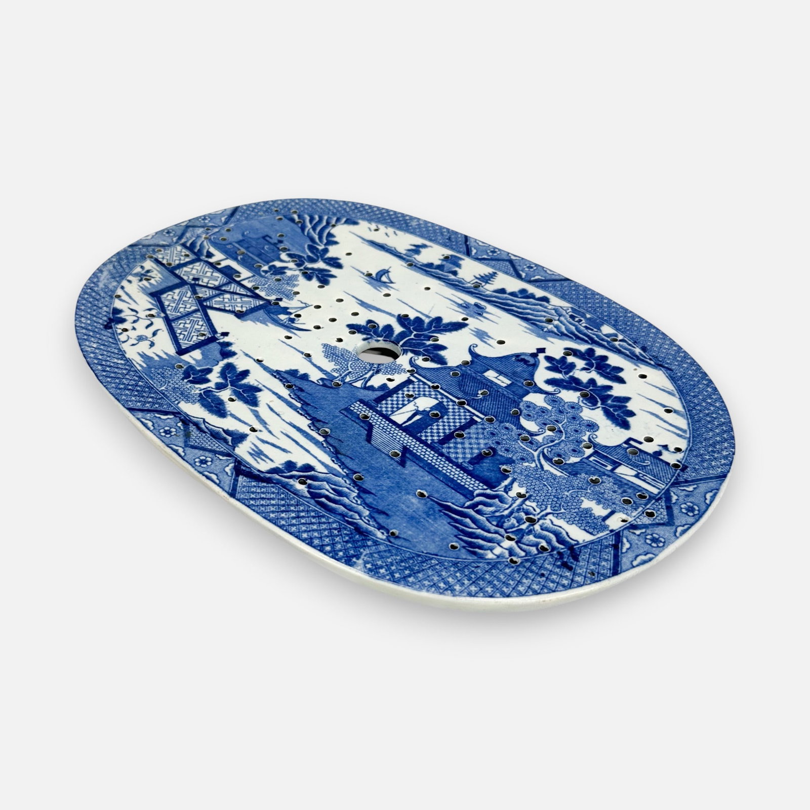 Antique Blue Willow Transferware Ceramic Meat Blood Draining Tray CHECK FOR REPAIR: Ca. mid 19thC. This is a rare inner tray that fits blue willow staffordshire platters.For shipping, we highly recommend Donald Camden at UPS Store 4608. Alternatively, reach out to one of our preferre