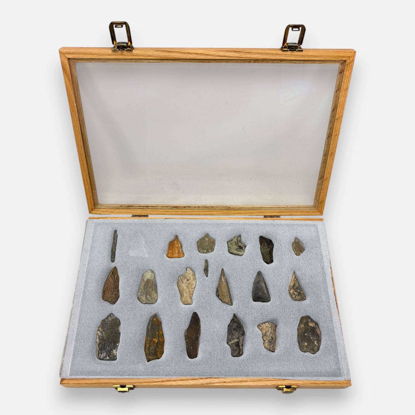 Native American Woodland Indian Stone Point Arrowheads Group #6: Largest arrowhead is approx. 3" x 1 1/2". Display case is approx. 12" x 18" x 2 1/4"For shipping, we highly recommend Donald Camden at UPS Store 4608. Alternatively, reach out to one of our preferred