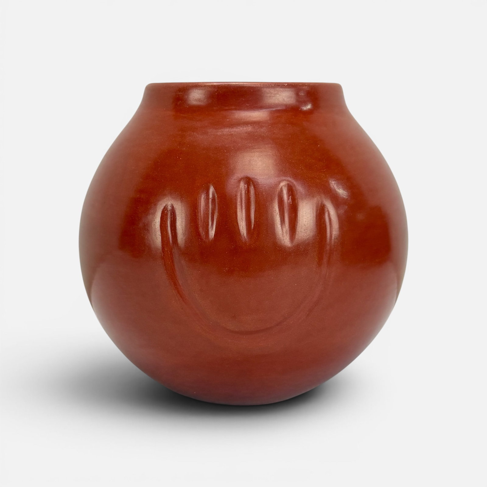 Tina Garcia San Juan / Santa Clara Pueblo Native American Pottery Decorated "Bear Paw" Jar: Ca. second half 20thC. Signed as shown. Remains in original condition, with no chips, cracks, scuffs, scratches or repairs. For shipping, we highly recommend Donald Camden at UPS Store 4608. Alternati