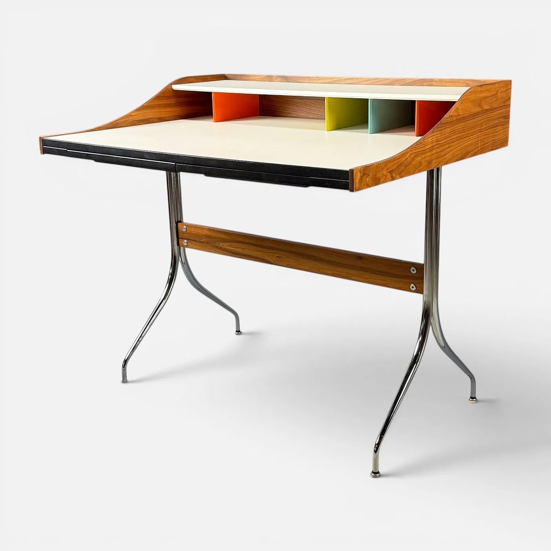 George Nelson for Herman Miller Laminate & Chrome "Swag" Desk: Ca. 21stC. Very good, with some light scratches and scuffs. Easily disassembled for shipping. For shipping, we highly recommend Donald Camden at UPS Store 4608. Alternatively, reach out to one of our