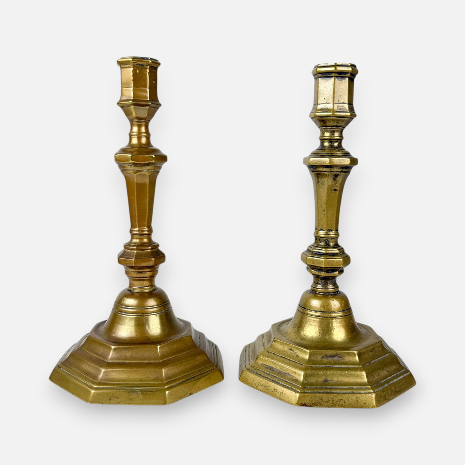 Pair Antique 18th French Brass Candlesticks: Ca. 18thC. Good age-appropriate condition. Ex. Robert Flourance collection, VA. For shipping, we highly recommend Donald Camden at UPS Store 4608. Alternatively, reach out to one of our preferred ship