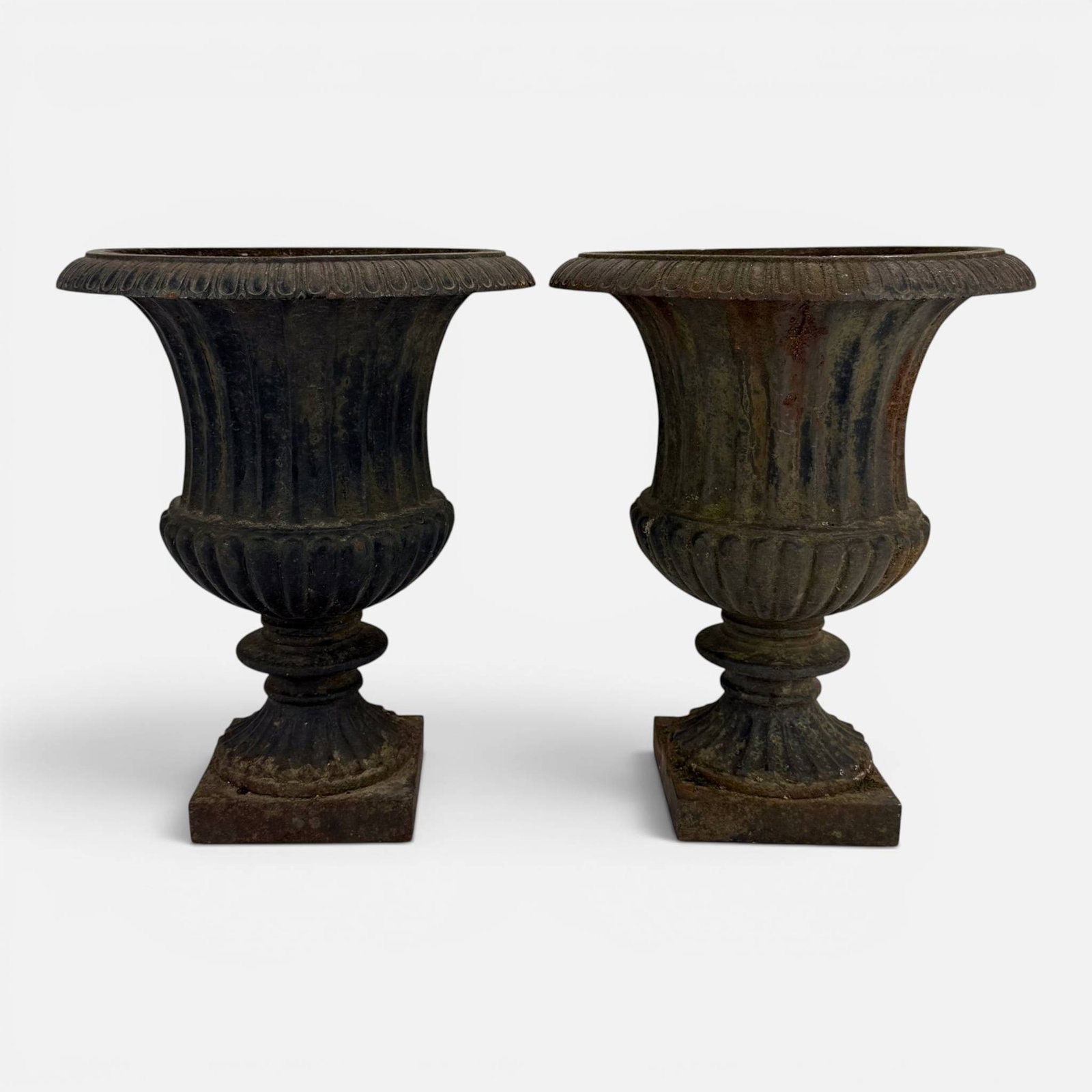 Pair Antique Cast Iron Campagna Urn-Form Garden Planters: Ca. late 19th to early 20thC. Very good with no chips, cracks or repairs. For shipping, we highly recommend Donald Camden at UPS Store 4608. Alternatively, reach out to one of our preferred shippers l