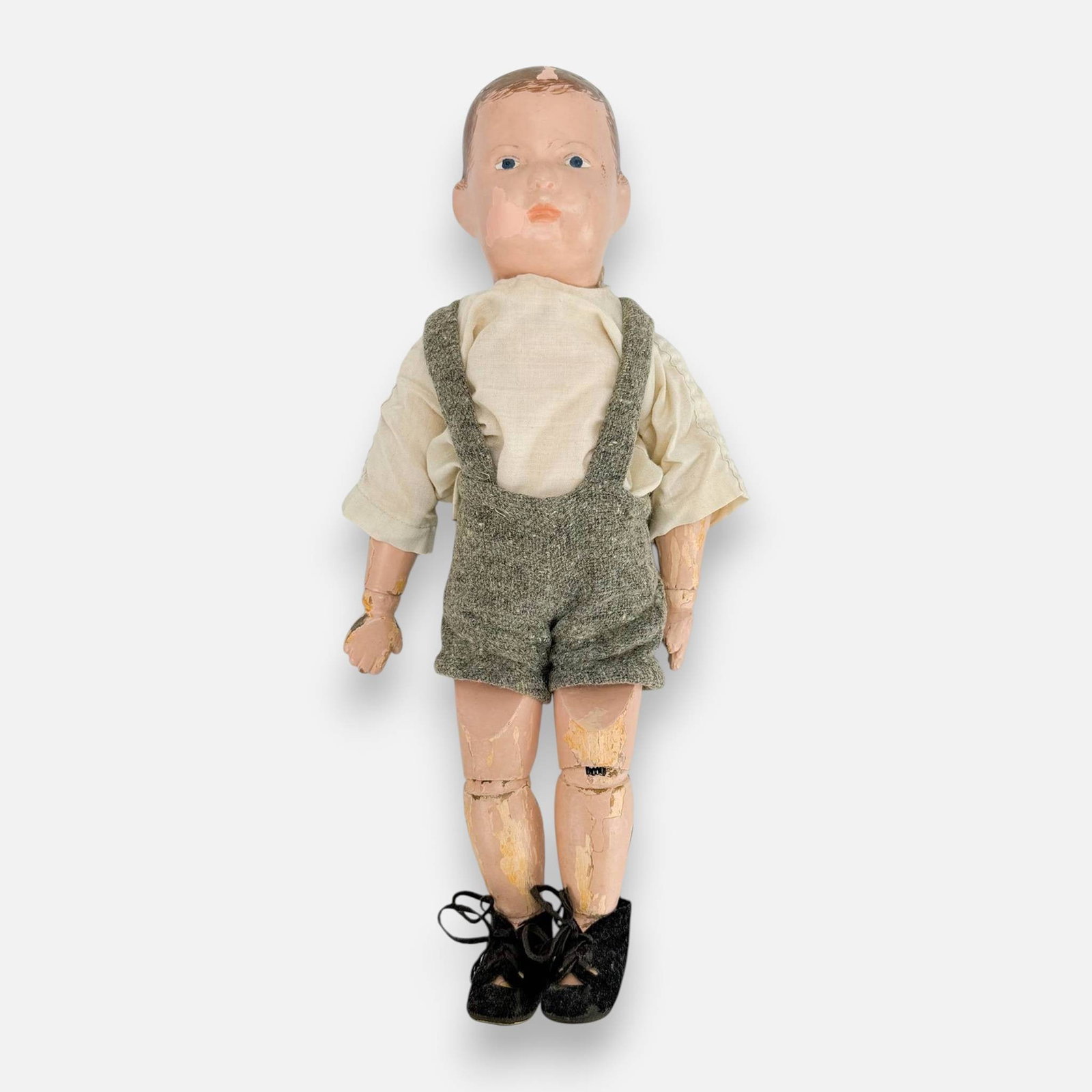 Antique Schoenhut Carved & Painted Wood Boy Doll: Ca. First quarter 20thC. The wood is complete with no breaks or missing parts. The paint shows wear and loss throughout. For shipping, we highly recommend Donald Camden at UPS Store 4608. Alternativel