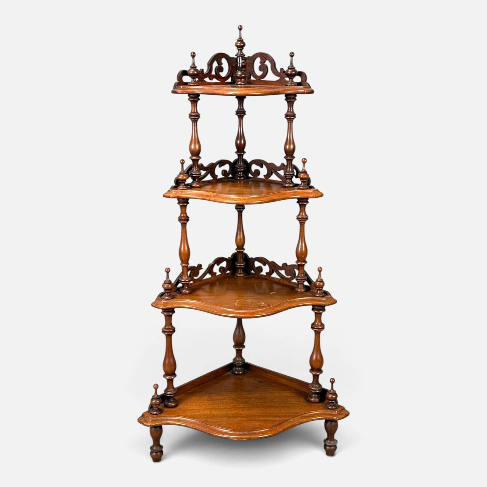 Antique Carved Wood Etagere Corner Bookshelf: Good, with shown age-appropriate surface wear, discoloration, and minor breaks. For shipping, we highly recommend Donald Camden at UPS Store 4608. Alternatively, reach out to one of our preferred